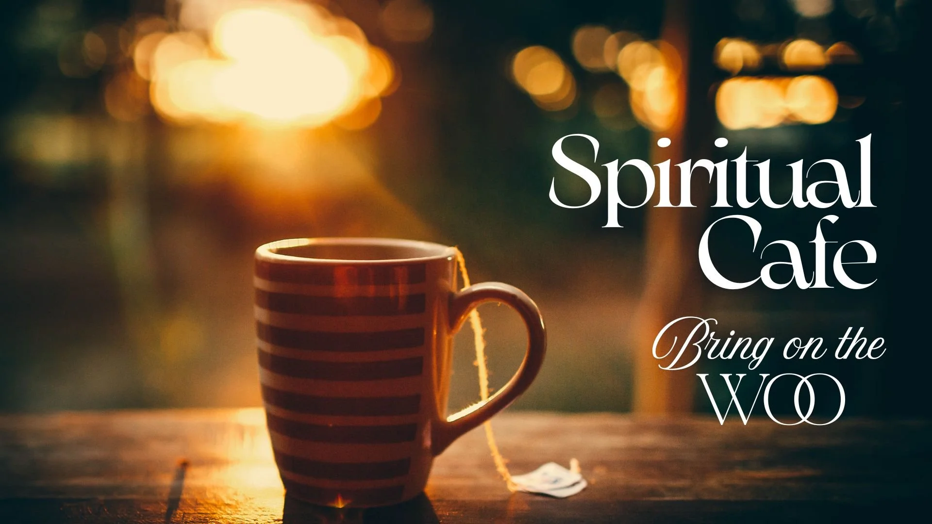 A striped coffee mug on a wooden table with a tea bag. The background shows a blurred sunset or sunrise with warm sunlight and bokeh lights. Text overlay reads 'Spiritual Cafe' and 'Bring on the WOO'.