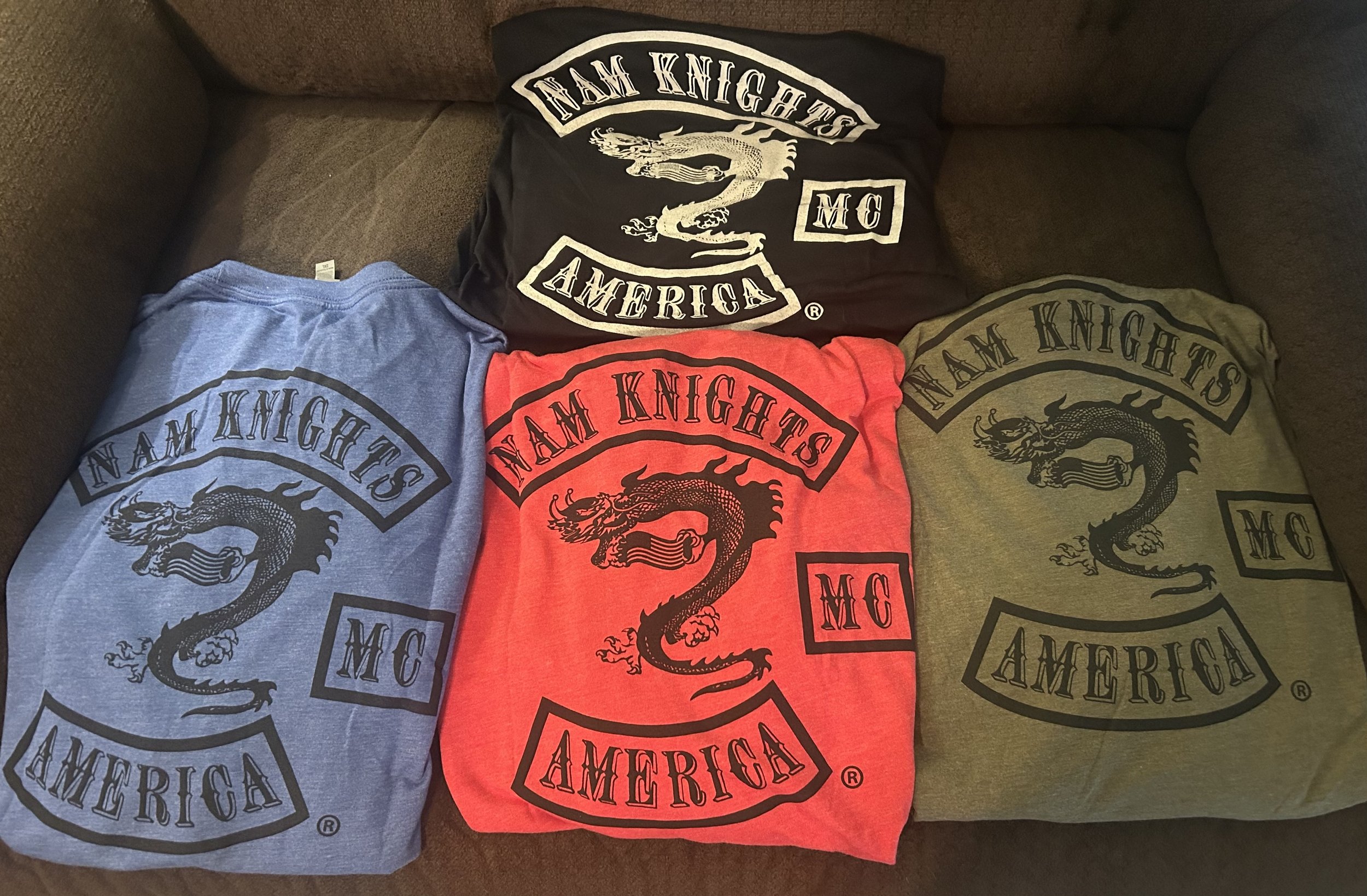 NK member shirt-available in black, red, olive and blue