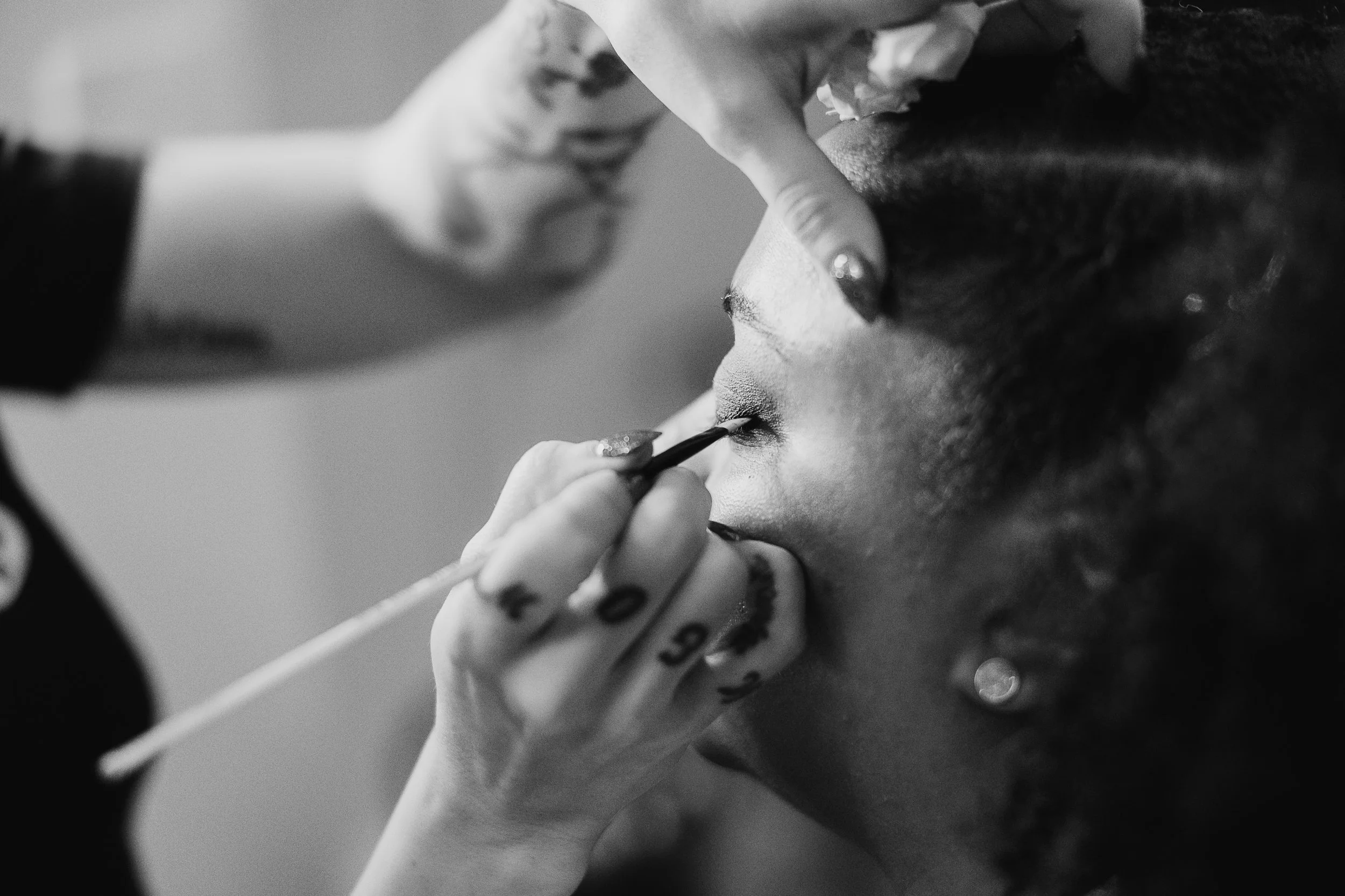 Andrea Betancourt applying Makeup