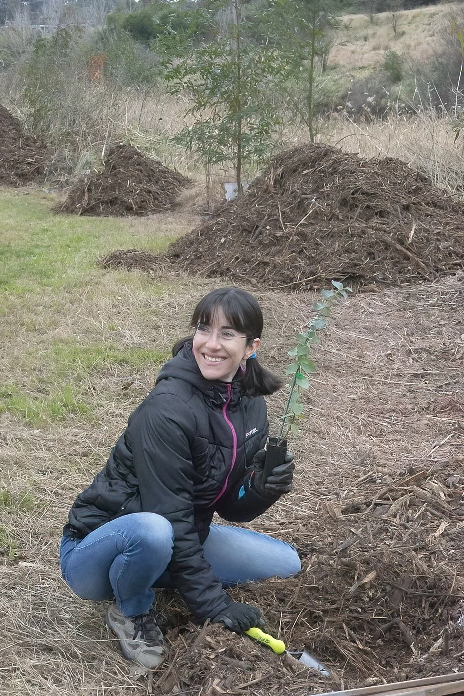 Woman with tree and a smile.jpg