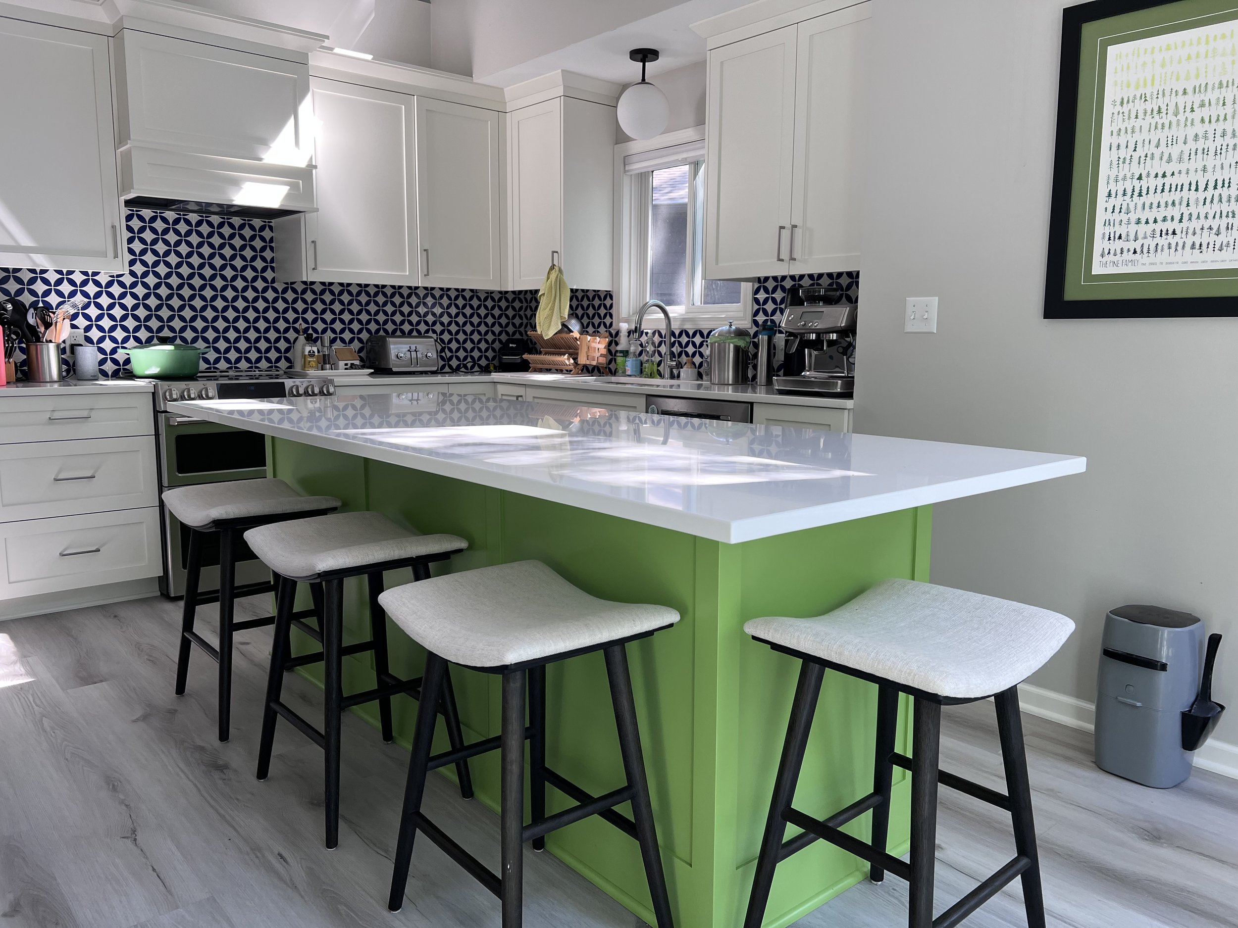 a photo of custom kitchen by Sean's cabinetry, with an island painted in Sherwin-Williams Stay in Lime SW 9032 | Sean's Cabinetry