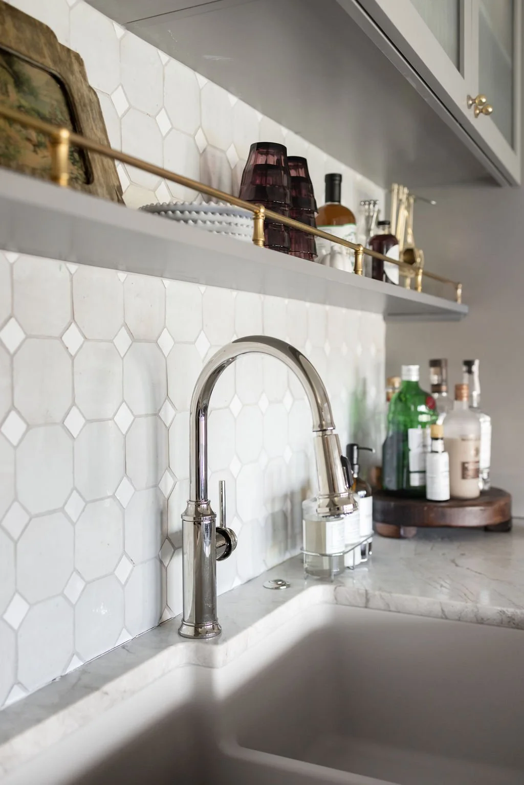 close-up photo of backsplash tile in a custom kitchen painted in  Sherwin-Williams Fawn Brindle SW-7640