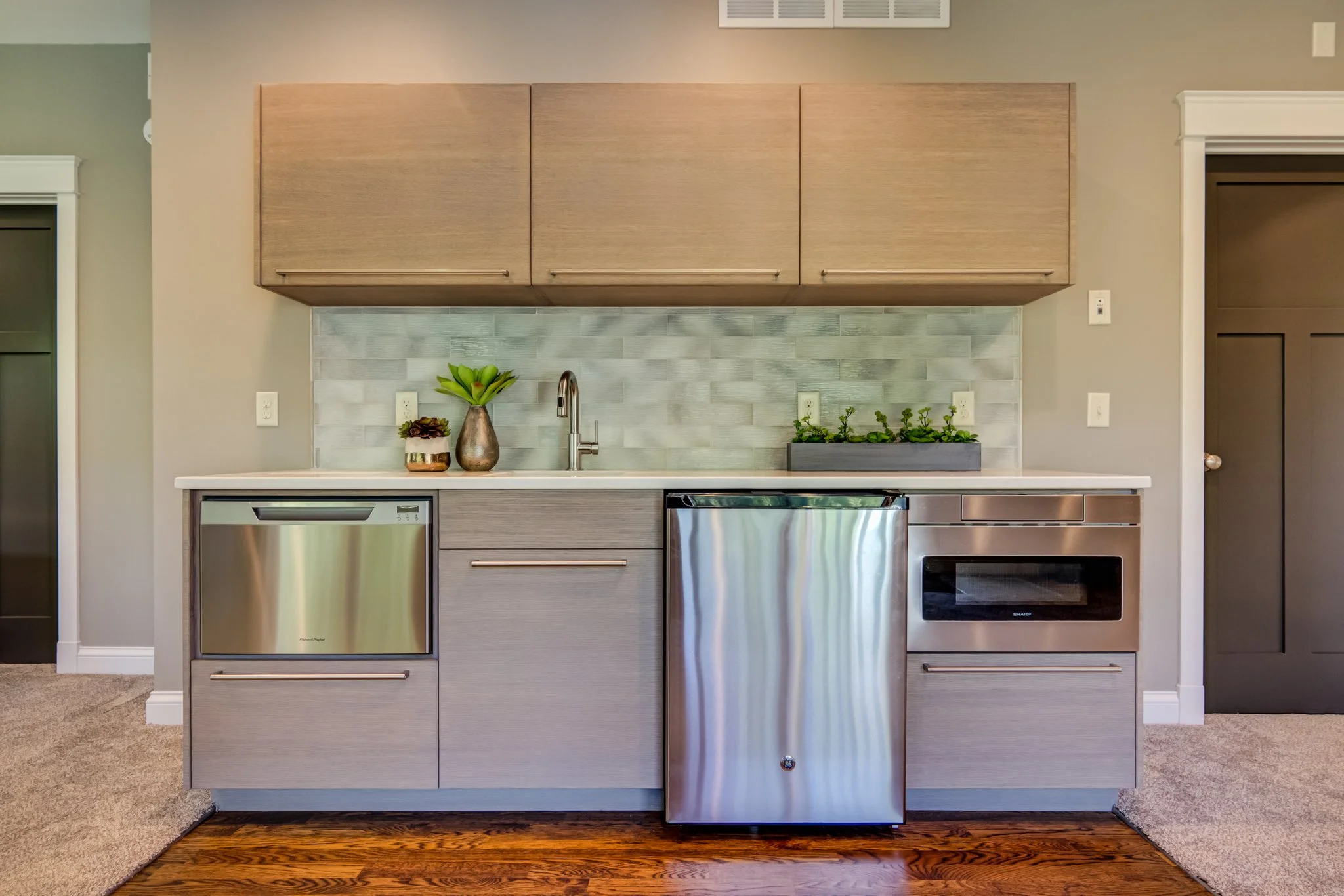 Why We Love An Integrated Vertical Lift Up Cabinet Door