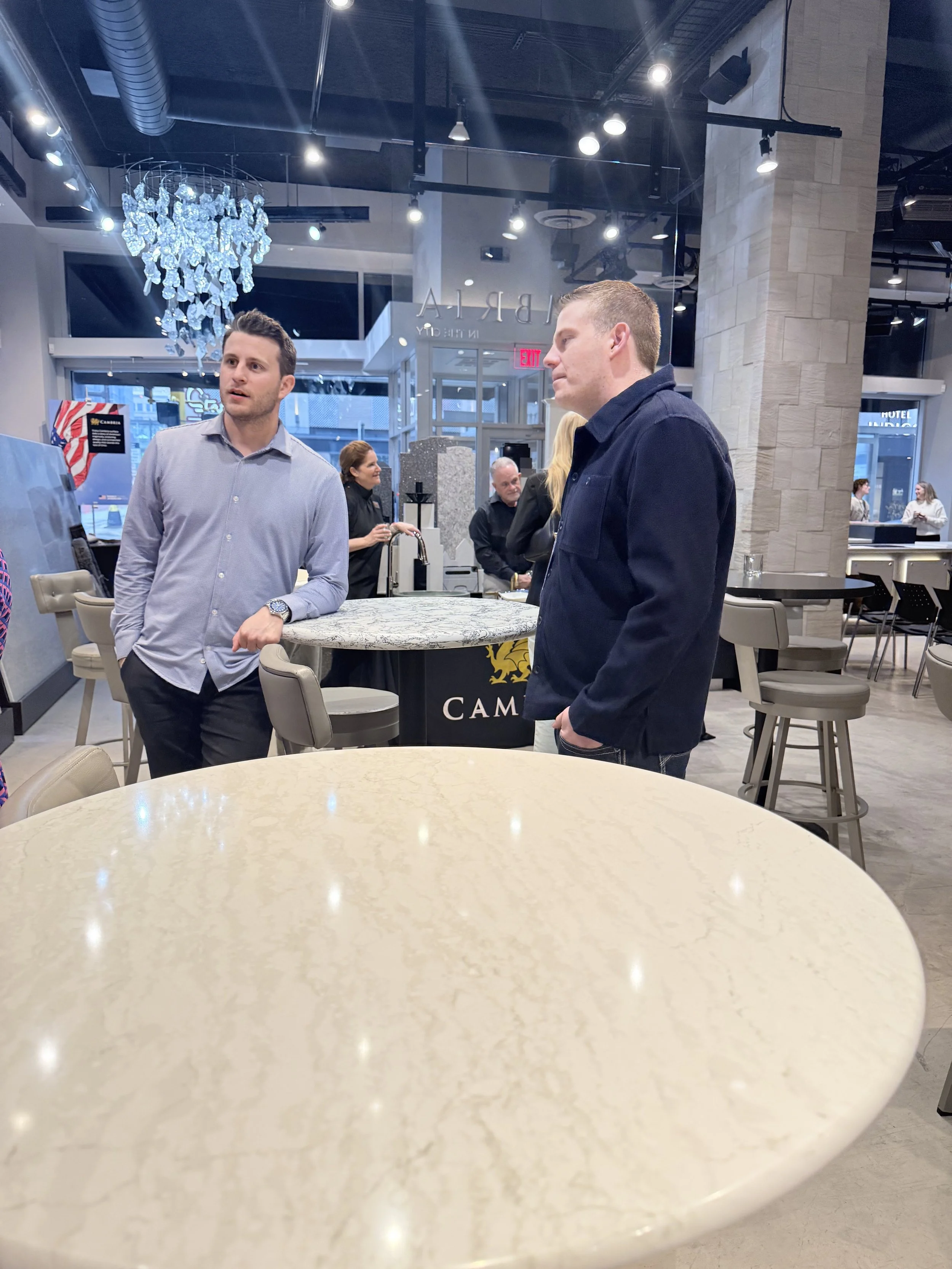 Sean Glessing of Sean's Cabinetry with a colleague after sharing on quality custom cabinetry at Cambria panel