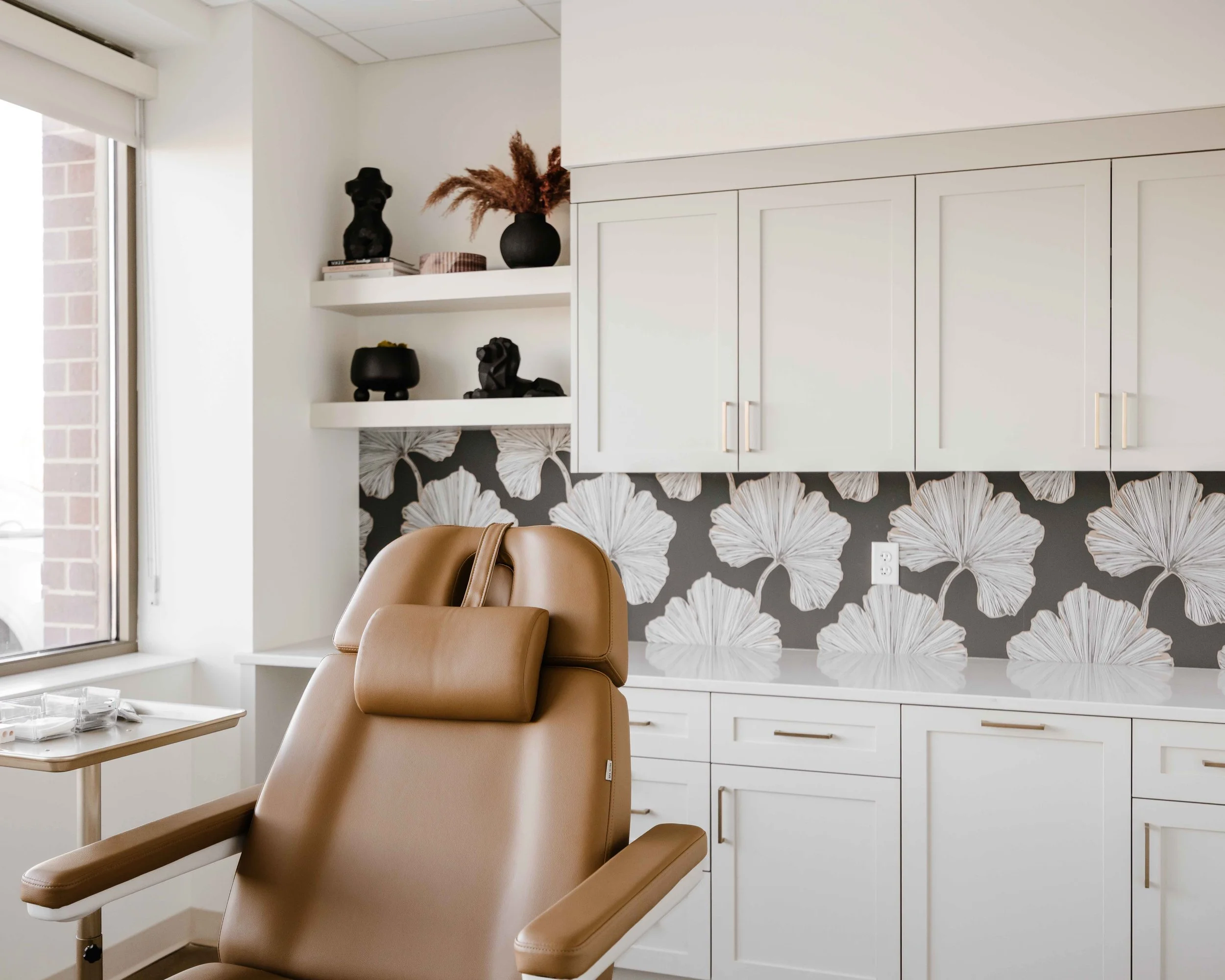 a photo of a treatment room at Remedy wellness: Treatment Room Cabinets in Benjamin Moore Edgecomb Gray by Sean's Cabinetry