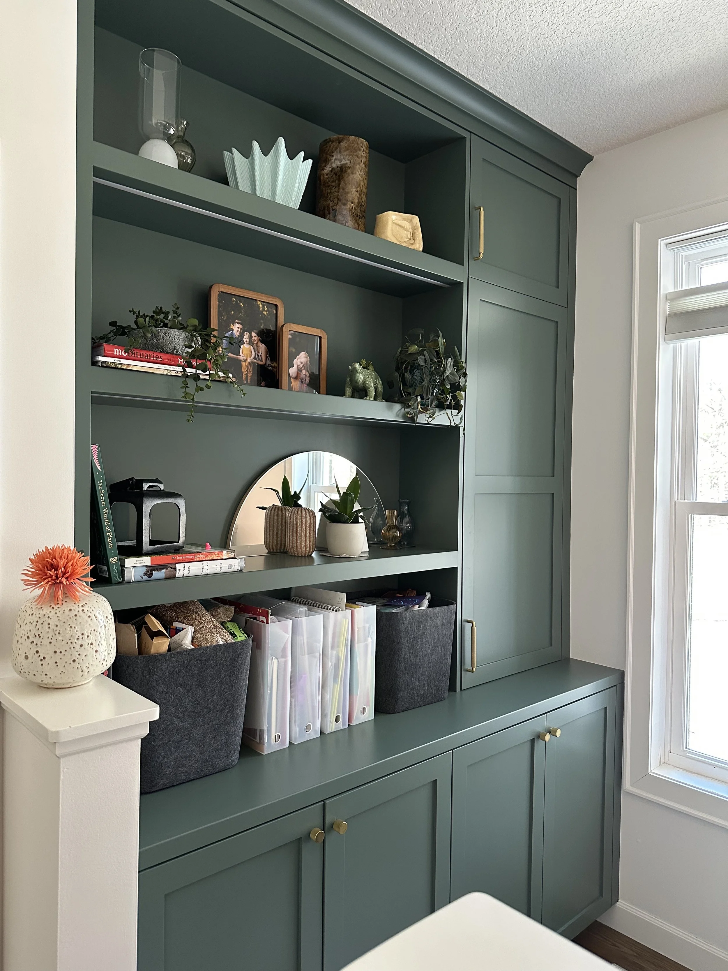 a photo of office built-ins painted in Caldwell Green HC-124 custom cabinetry crafted by Sean's cabinetry