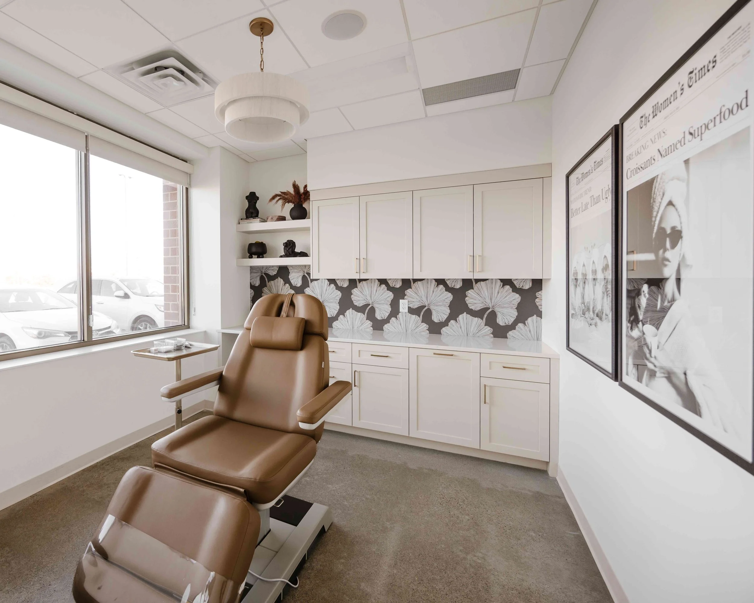 HanStone Montauk Countertop, Azurea Wallpaper, Treatment Room Cabinets by Sean's Cabinetry