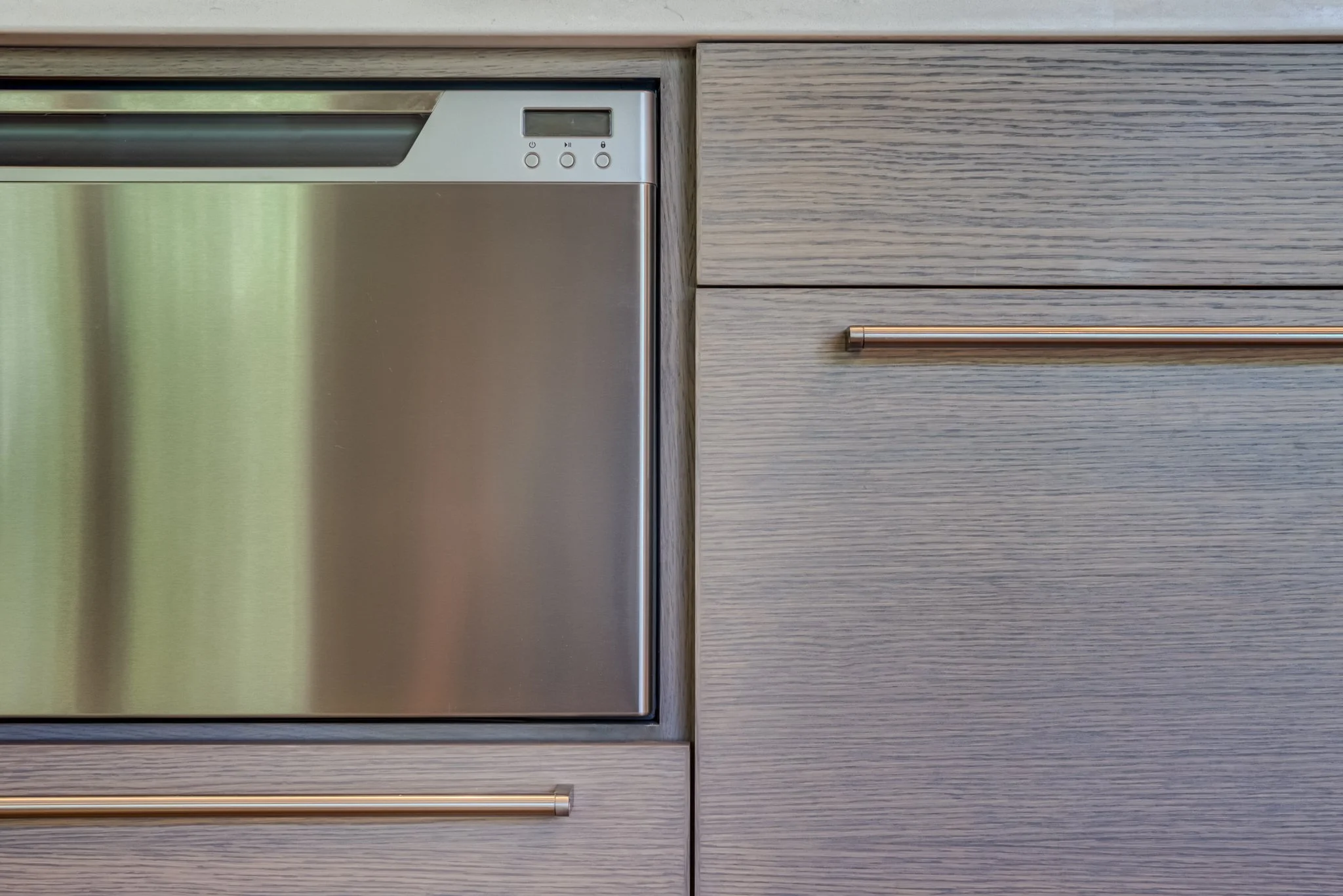 custom cabinetry on a living room wet bar inrift white oak with a custom gray stain