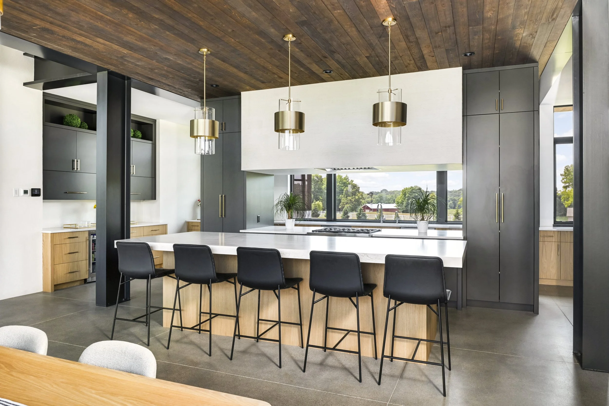 custom cabinetry cost is 35,000 + in a large kitchen in a custom home with an open floor plan