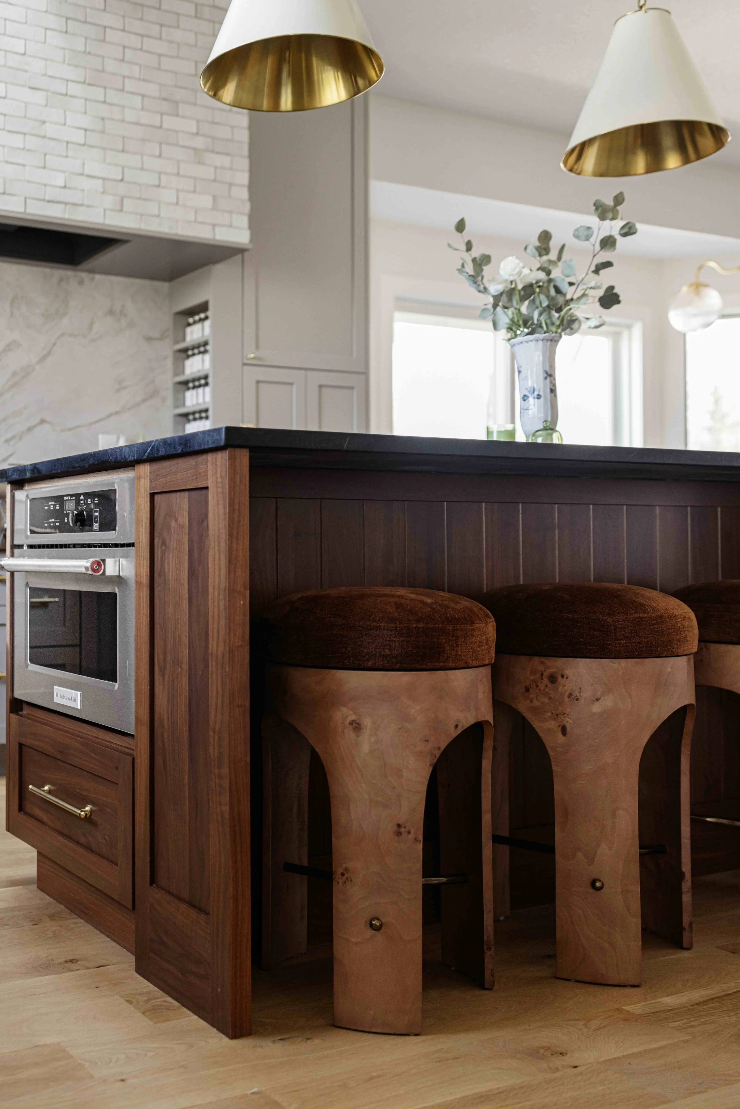 dark walnut kitchen island with Burl wood counter stools