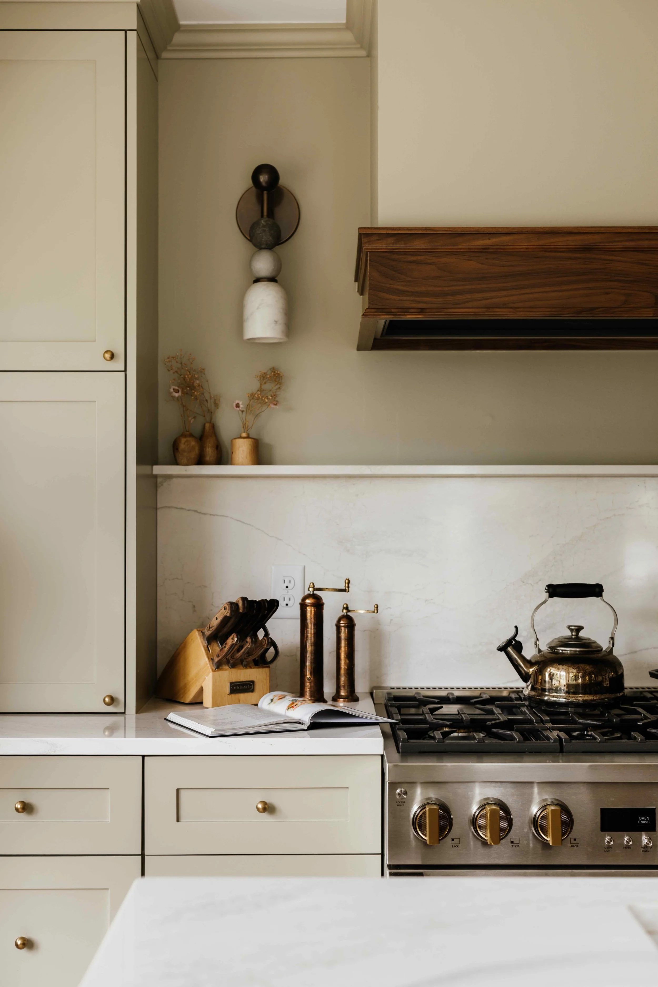 farrow and ball ash grey custom kitchen in edina minnesota with an Alabaster Wall Sconce With Marble Sphere and Brass