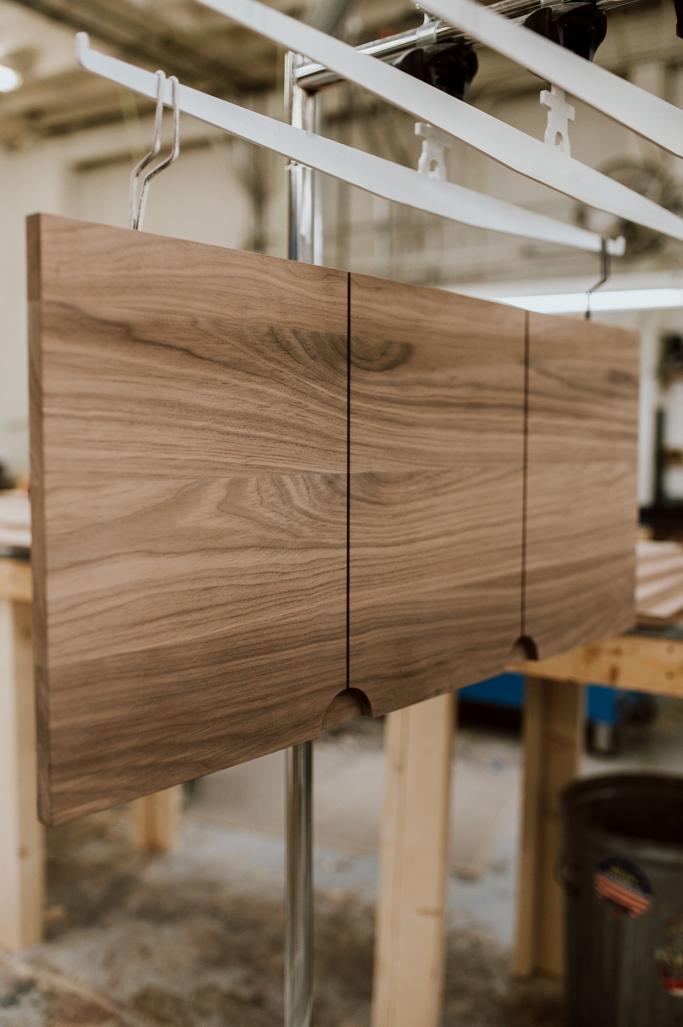 doors for Custom Office Cabinetry are hanging upside down in the shop at Sean's cabinetry