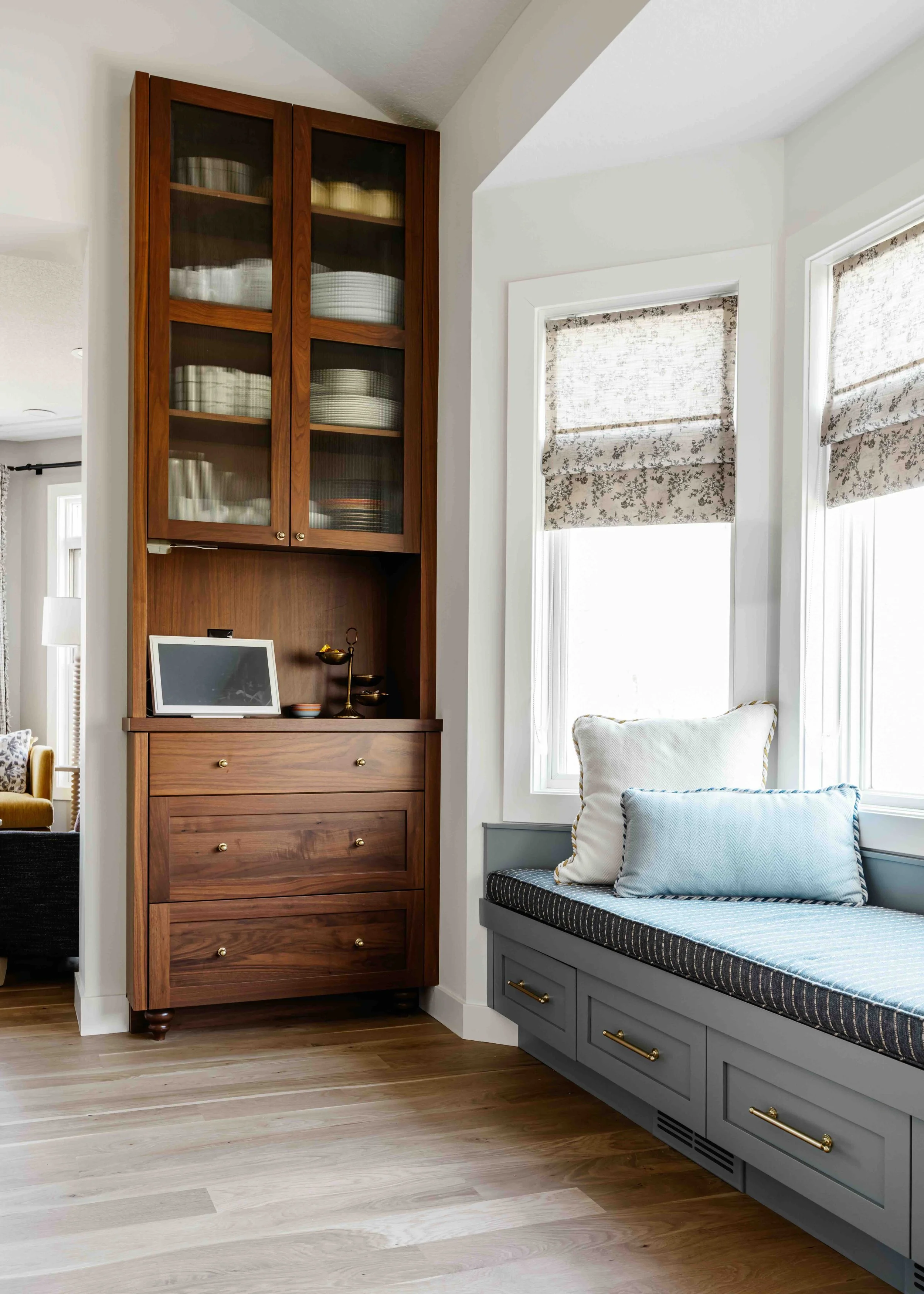 floor to ceiling custom piece with a Proper Walnut China Cabinet on top and dresser on the bottom