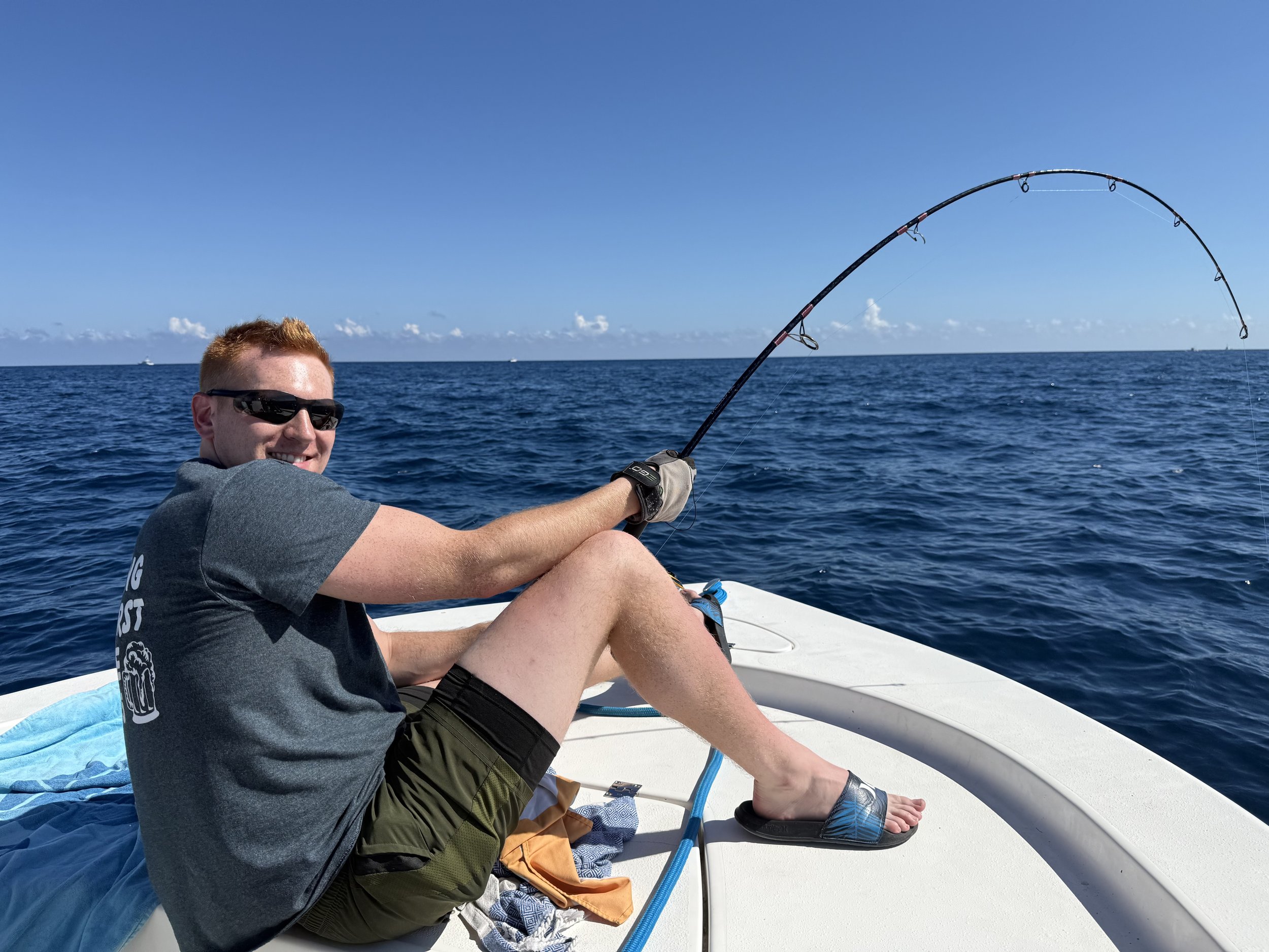 Sam Miller, Sales Process Expert at Sean's Cabinetry is fishing on a boat