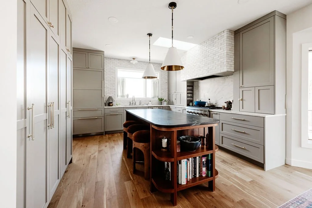 u-shaped kitchen pained in  Sherwin-Williams Fawn Brindle SW-7640 with custom cabinetry by Sean's cabinetry