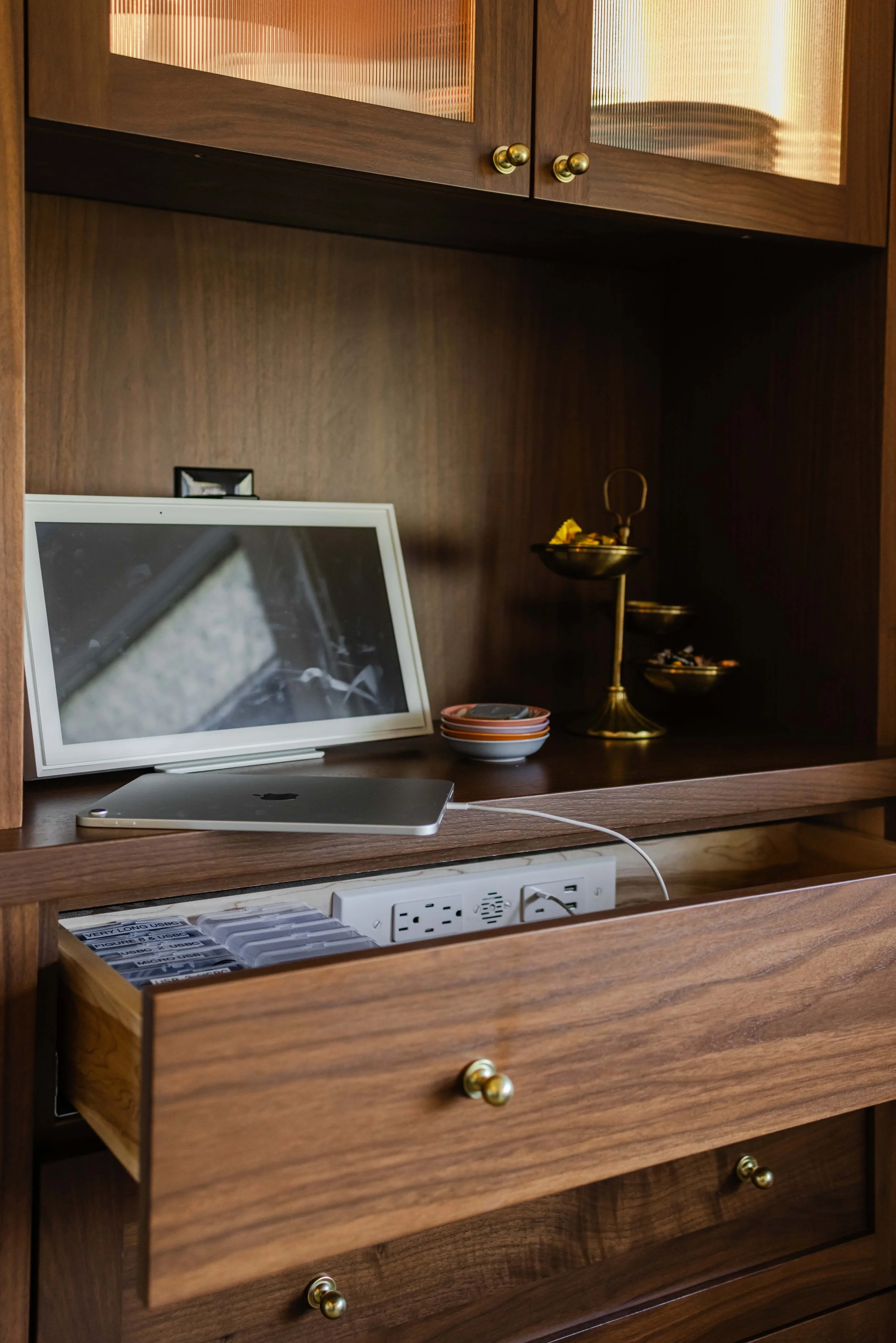 top drawer of the custom dresser with a charging station