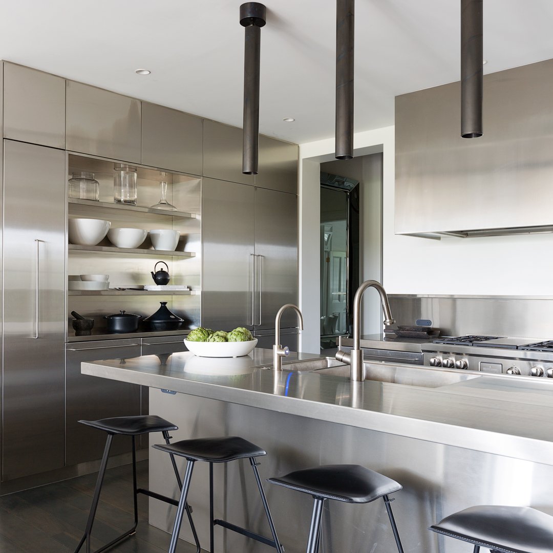 There's a rise in stainless steel being used in kitchens and we aren't mad about it! Sleek and enduring, we can understand why it is a popular finish for hardworking spaces like kitchens. 

Here are a couple of our projects where stainless steel is a