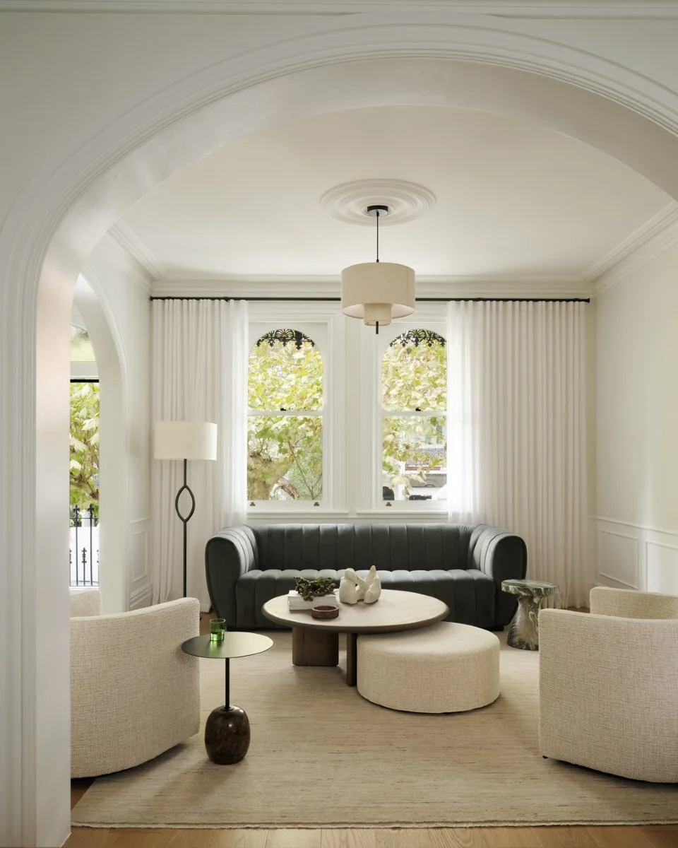 Windsor House | Curtain Details

At Windsor House, every design decision was made to enhance light, scale, and connection to the outdoors &mdash; and the curtains are no exception.

In the formal living room, full-height sheers sit just below the cor
