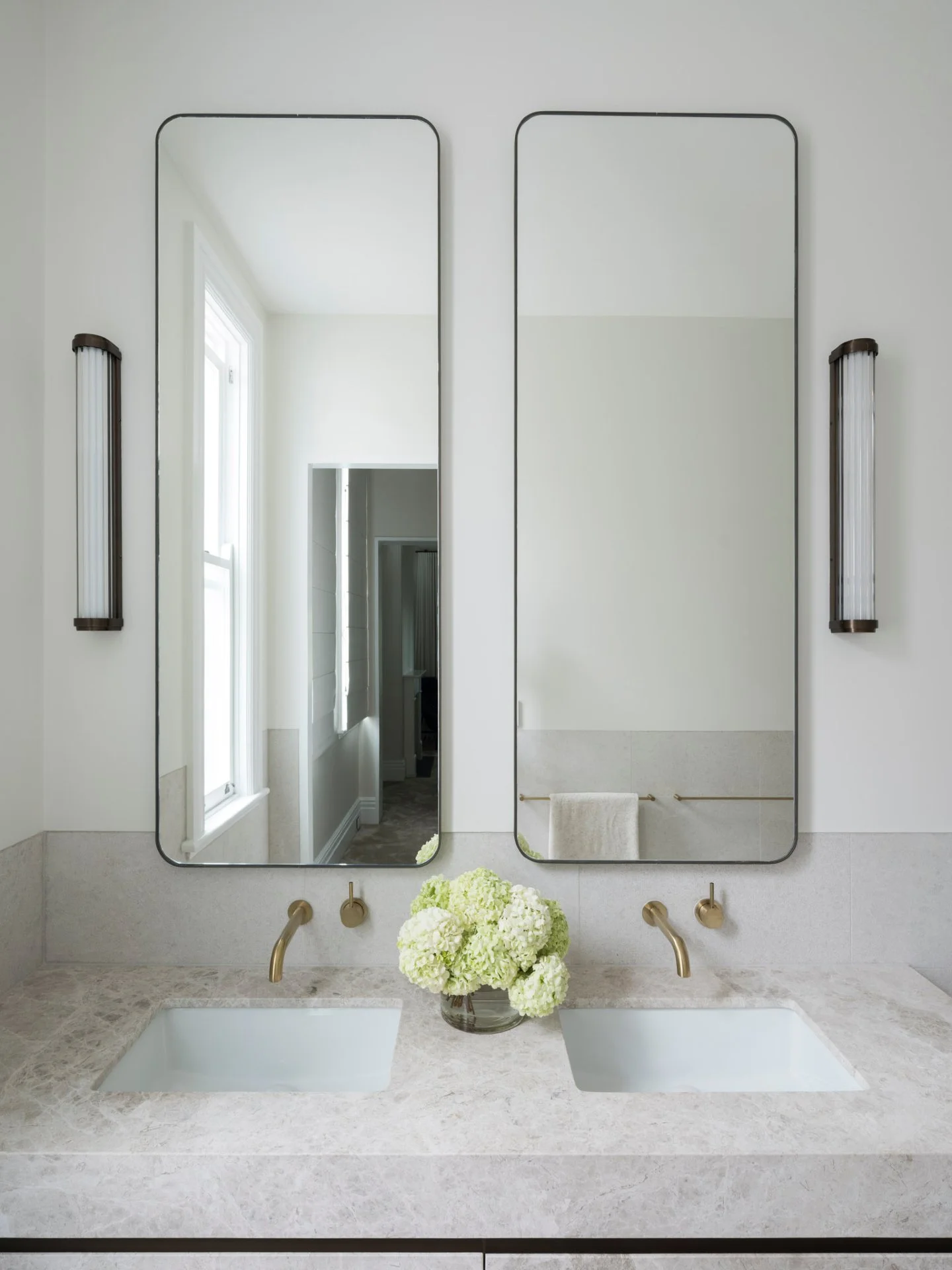 Ocean House | Master Ensuite 🤍

As part of the upstairs replan, the former middle bedroom was removed to create a generous walk-in robe and a beautifully proportioned master ensuite. The space embraces a soft, classical, and timeless palette, layere