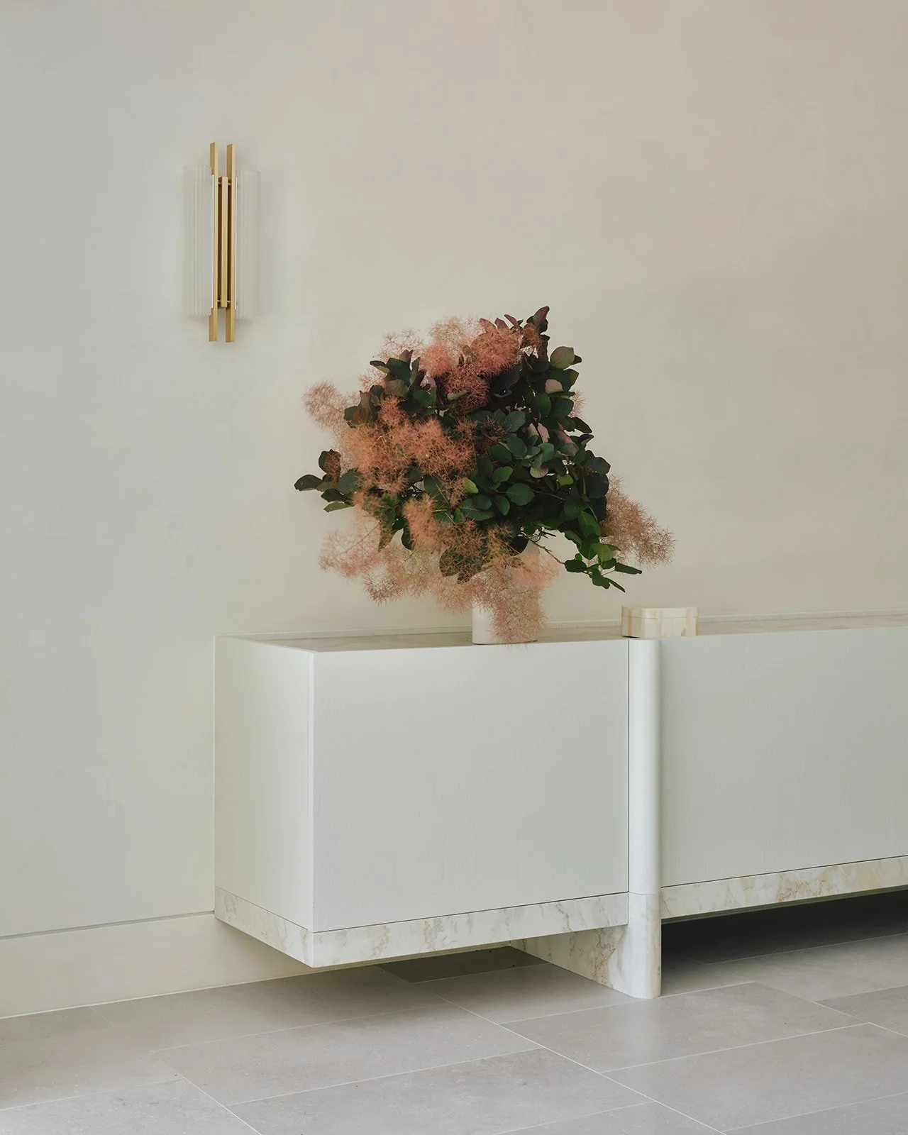 Bellevue Hill House | Joinery Detail

Bespoke joinery pieces designed by the Modify interiors team and custom made in Sydney bring refinement to the open-plan dining space.

Crafted with deep storage drawers, natural stone detailing and oak veneer fr