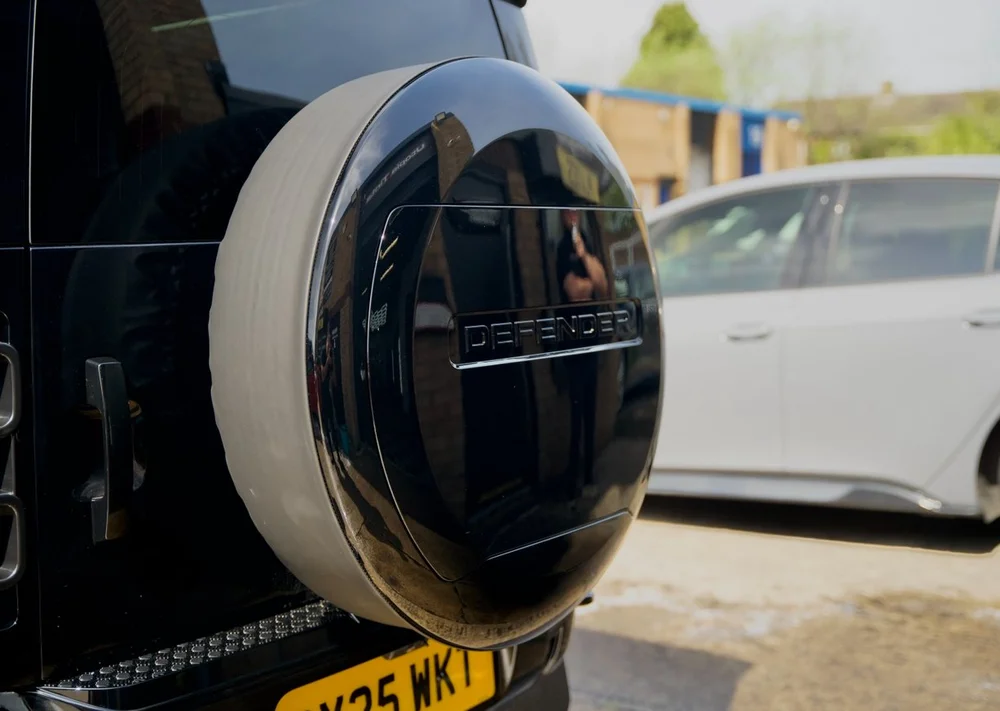 Genuine Land Rover gloss black Defender spare wheel cover