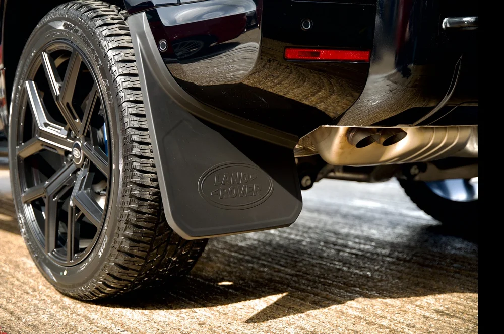 Genuine JLR classic mudflaps fitted to Defender