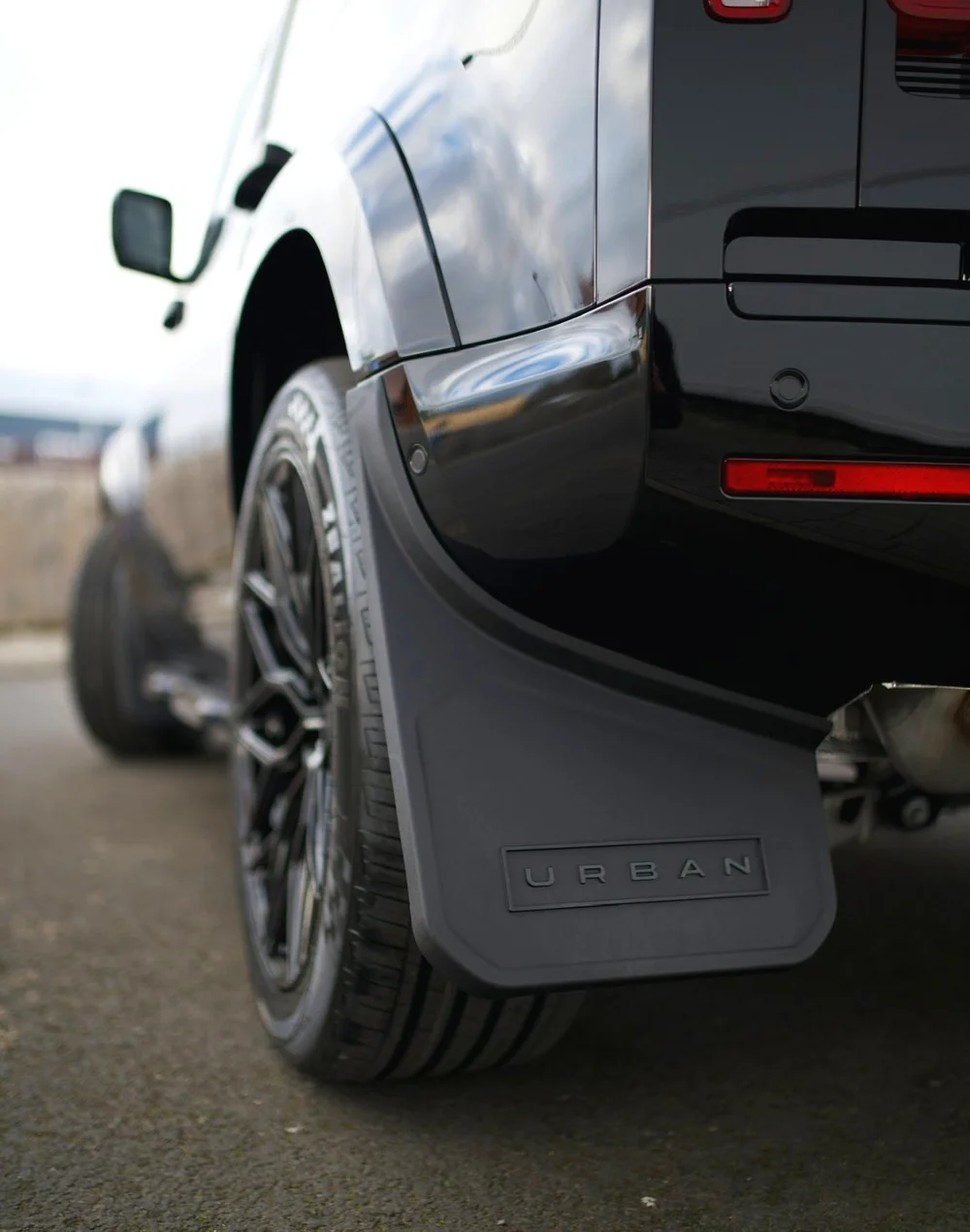 Urban Automotive branded mudflaps on Defender