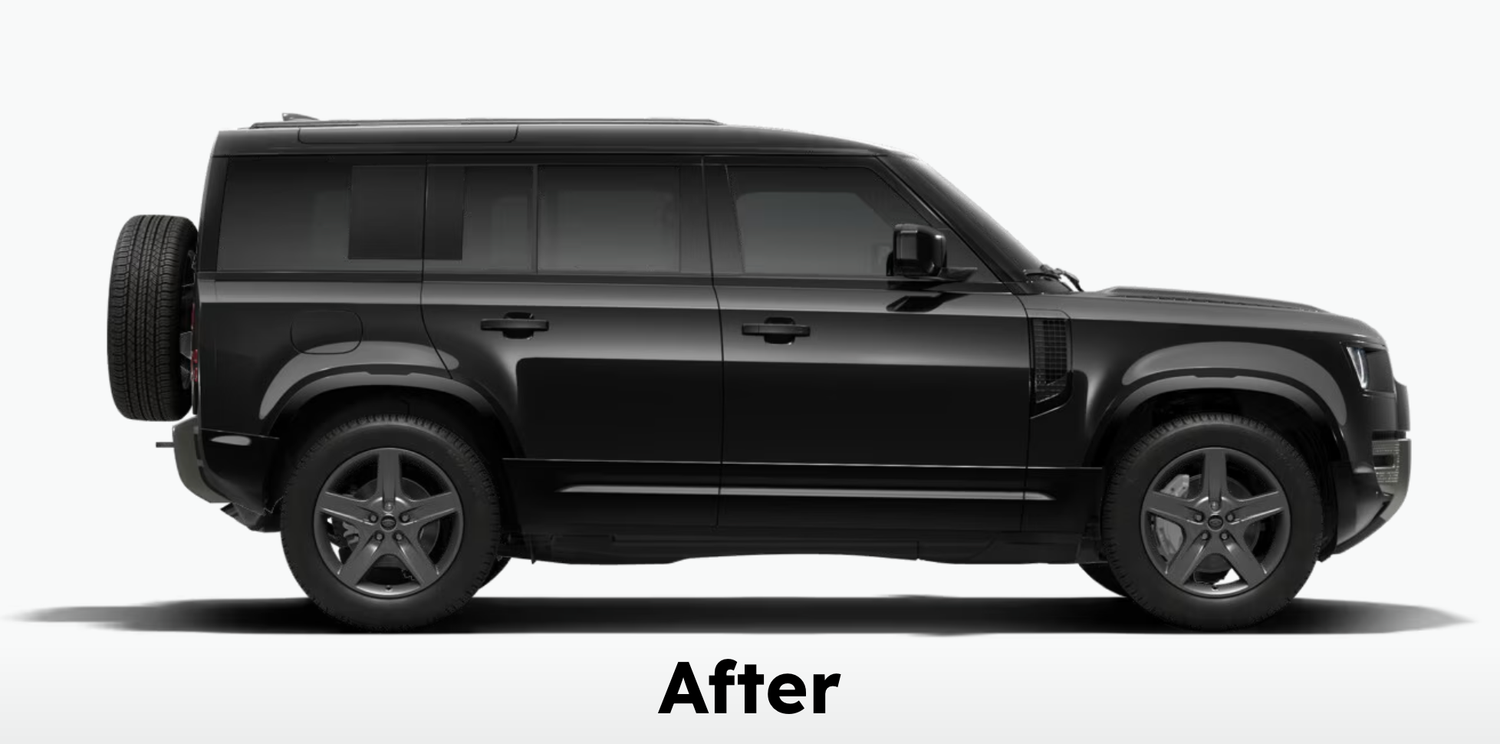 Land Rover Defender side profile with gloss black side bumper trims along the lower doors