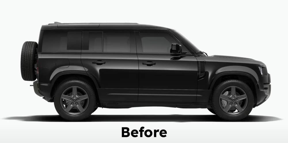 Before: Defender side profile with the factory matte black lower door trims