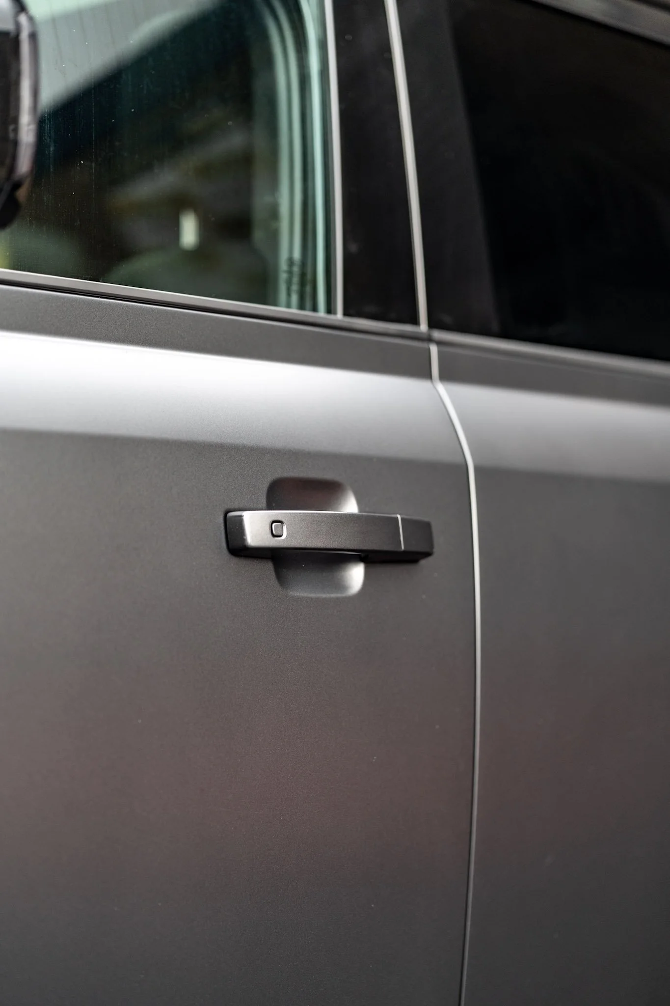 Detail shot of protected Defender door panel. Self-healing Paint Protection Film keeps high-contact areas looking immaculate.