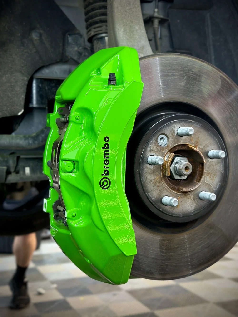 Green painted brake calipers