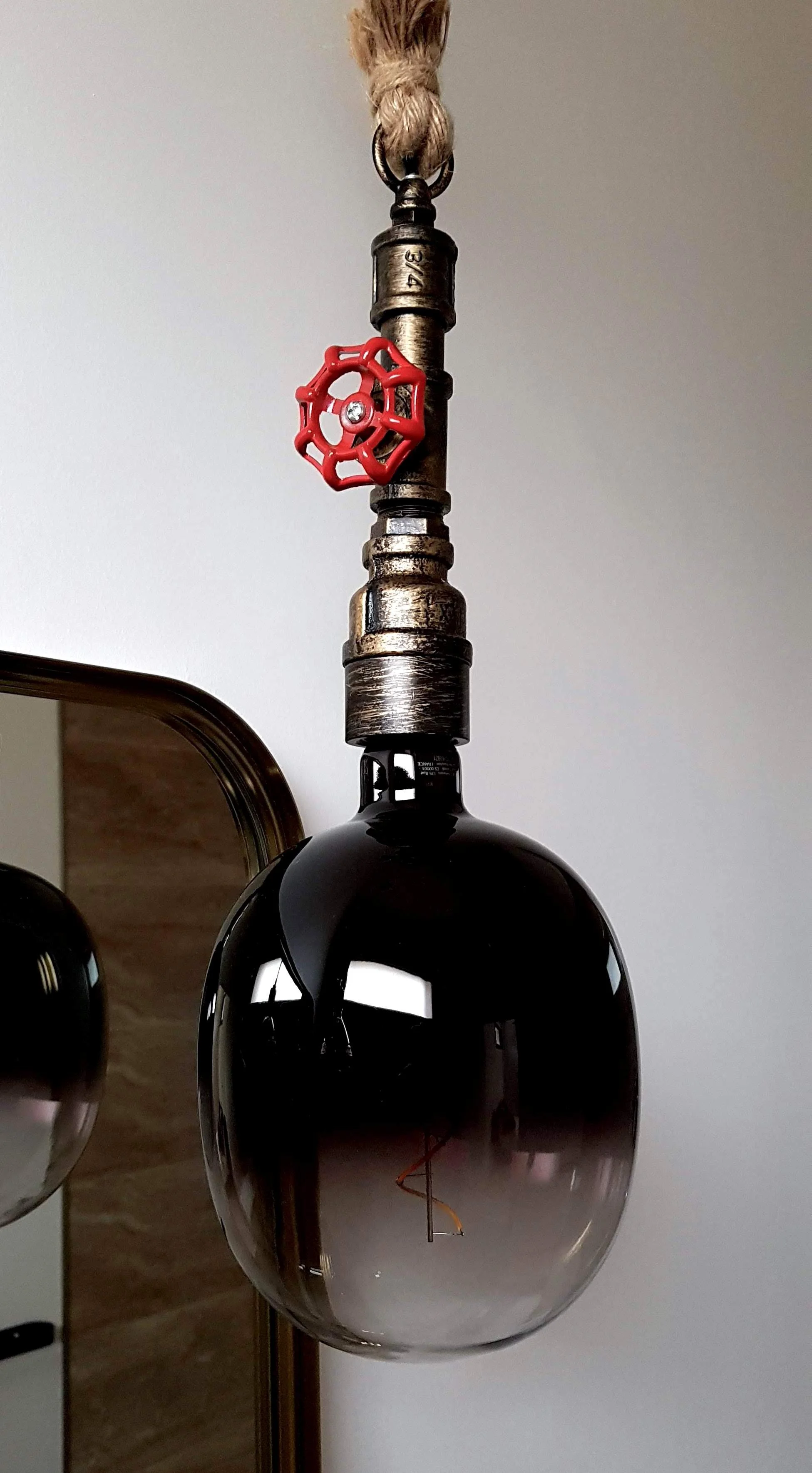 Crimson Rose Guest bedroom large industrial light in ensuite bathroom.jpg