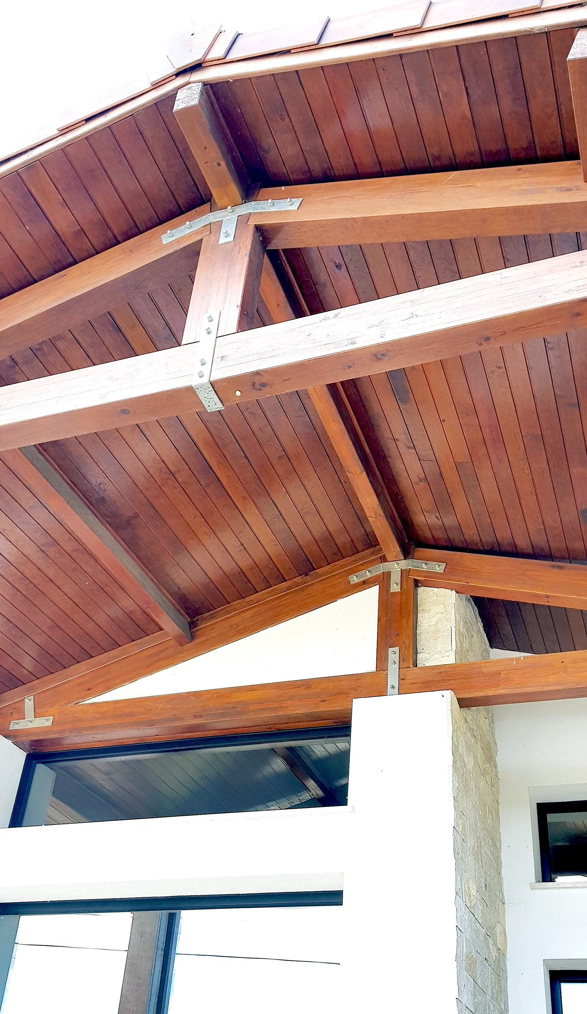 Wood chalet style roof entrance design for our Portugal holiday Villa