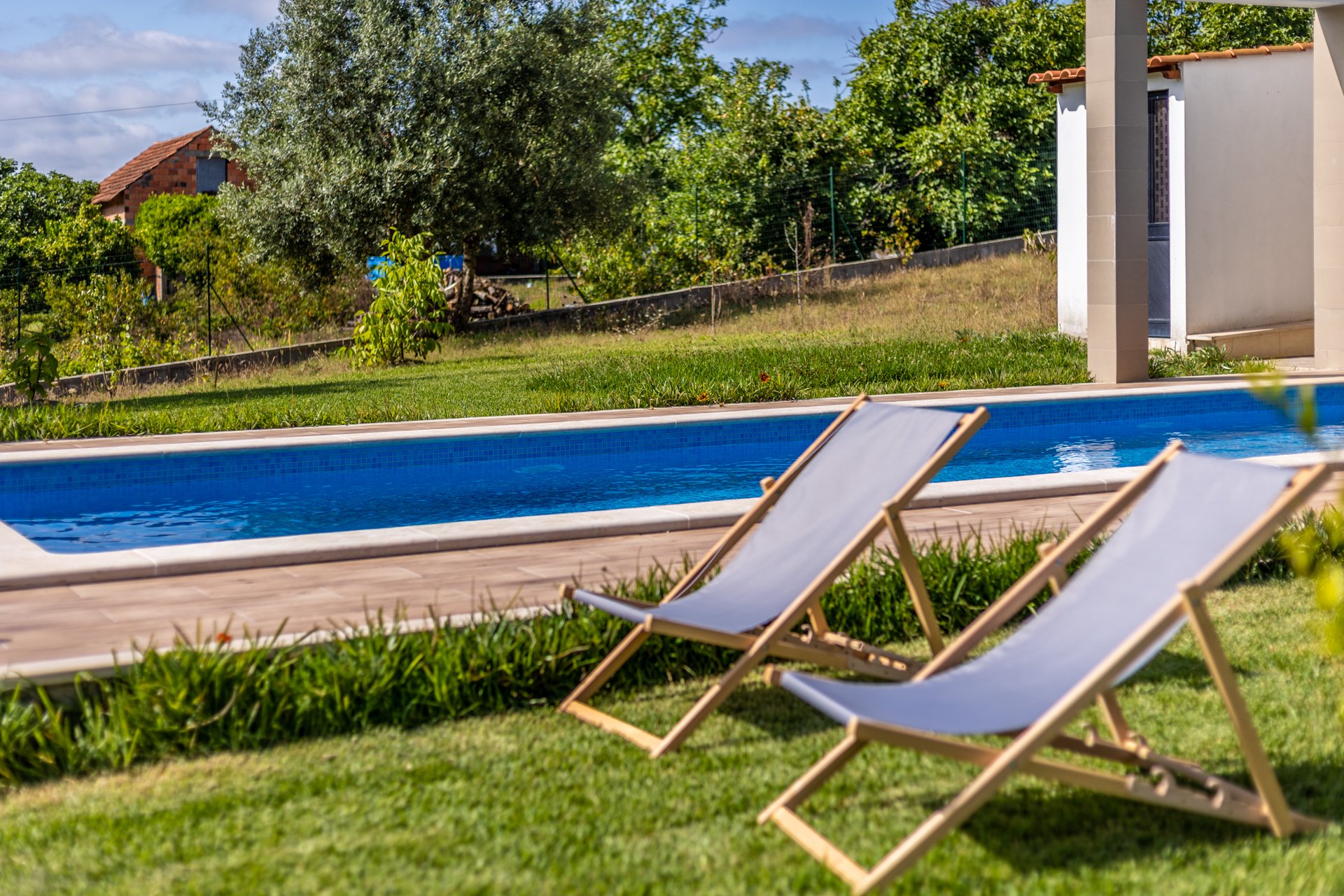 Private swimming pool, sun seats, view orchards