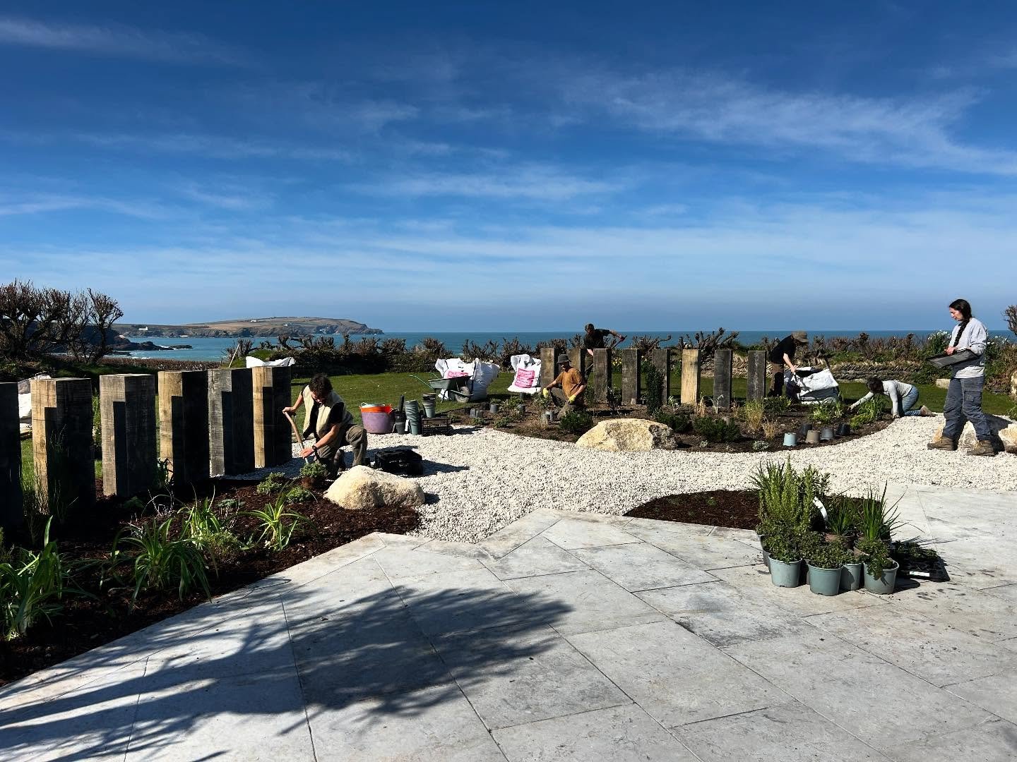 Spring planting in the hot sun at one of our coastal projects right on the beach! The weather is always like this in Cornwall don&rsquo;t you know 🤥 😂 
.
.
@crest__landscaping @quornstoneofficial @rainbowplantsltd #gardendesign #coastalgarden #land