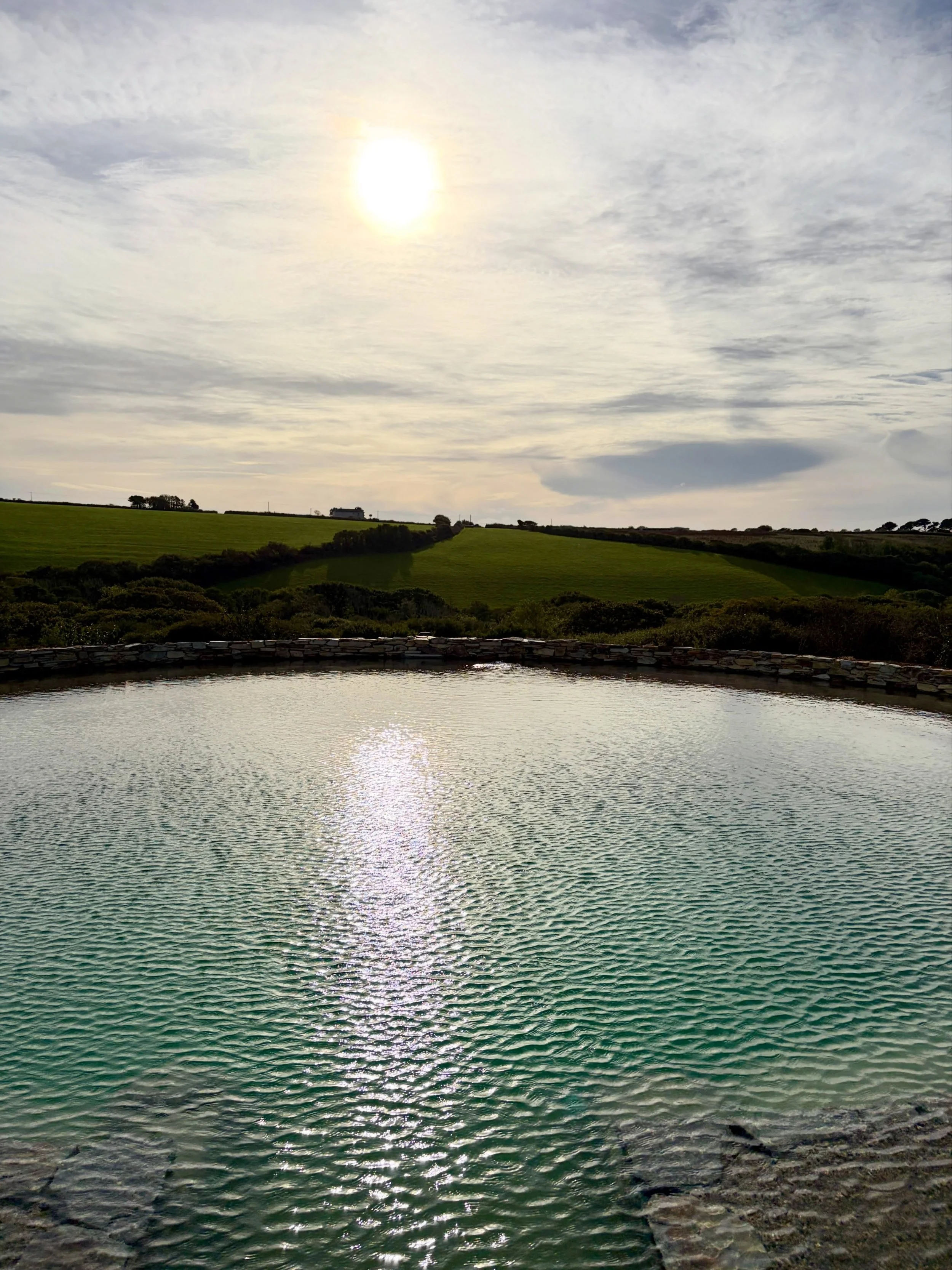 Glorious views often need simple, bold forms to complement through subtle contrast. At one of our St Mawgan projects two circular pools arrest the eye and together point to Mawgan Porth beach in the distance. Perhaps most importantly they mirror the 
