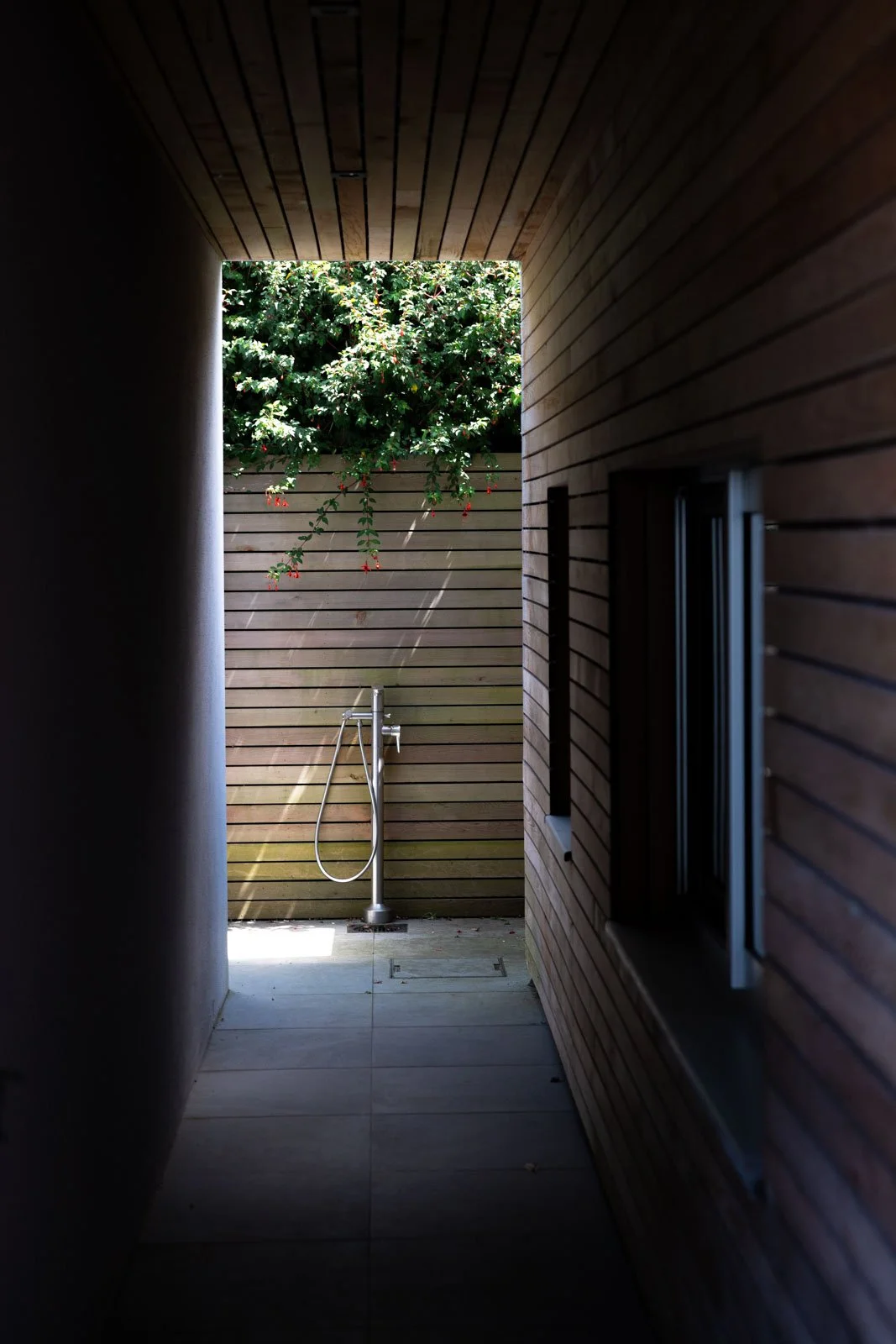 Outdoor shower and cedar cladding 