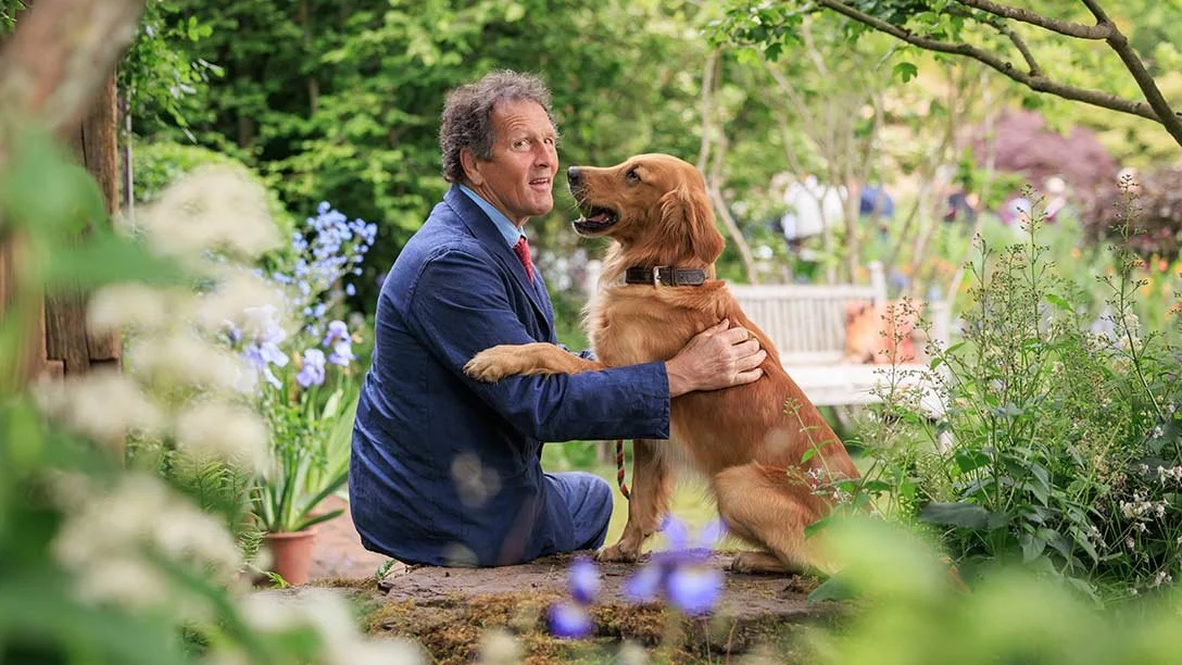Monty Don and a dog at the RHS & BBC Radio 2 Dog Garden, RHS Chelsea 2025