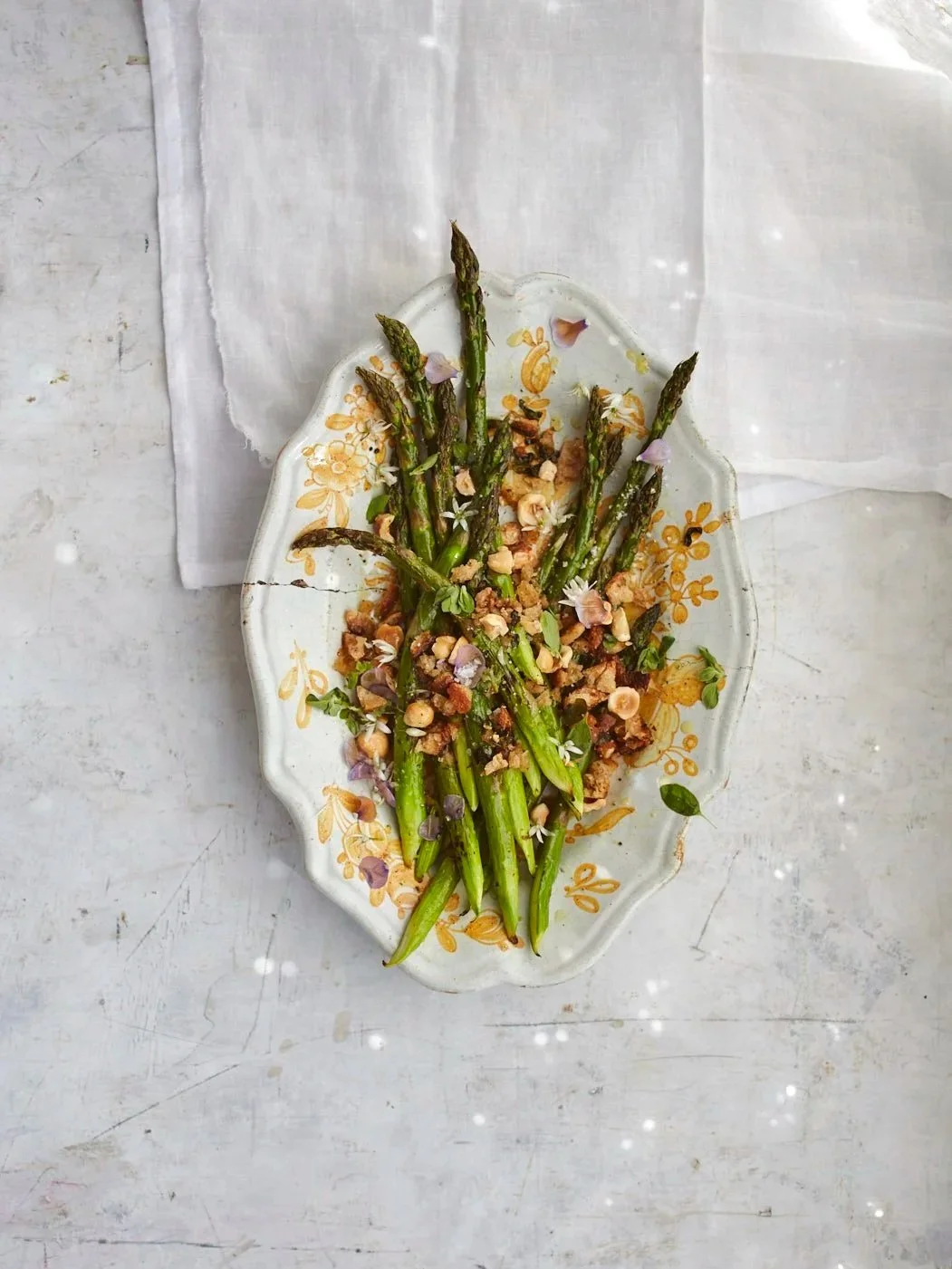 Roasted Asparagus with hazelnuts, garlic, marjoram and sourdough crumbs&nbsp;