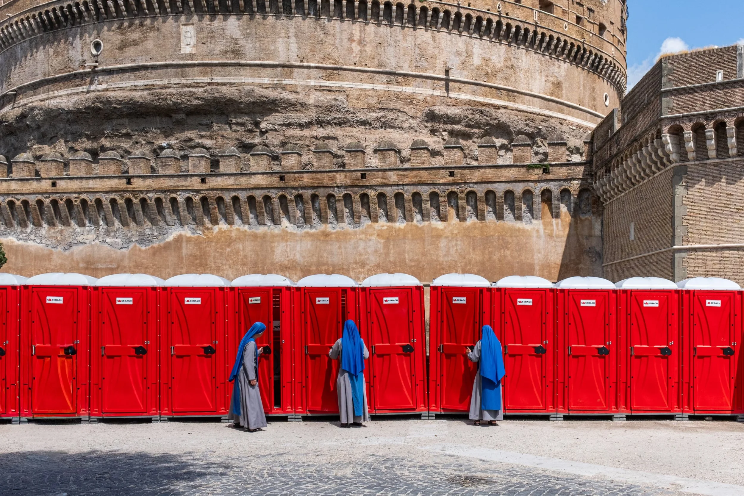 Nuns consider the temporary toilets installed outside Castel Sant’Angelo