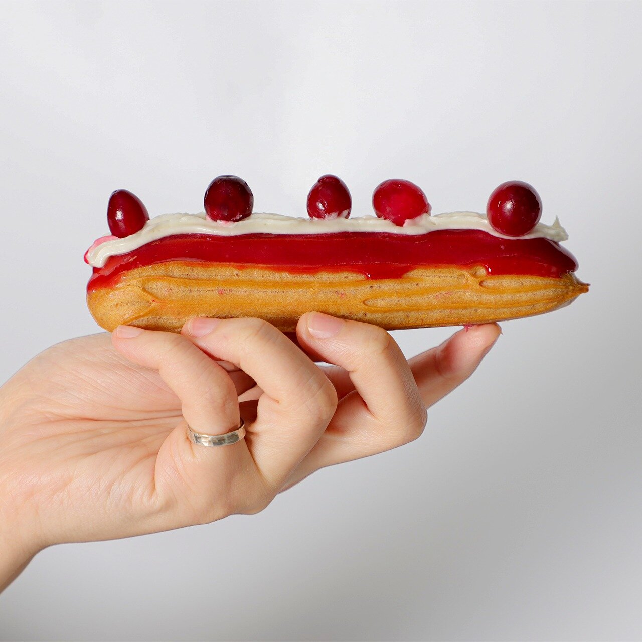 Very Cranberry
This beautiful dessert is filled with a creamy cranberry filling, topped with some whipped cream and cranberry fruits. Talk about a flavor explosion!

Wanna try it out? Contact us to get your free sample 📩

#&eacute;clair #afternoonte