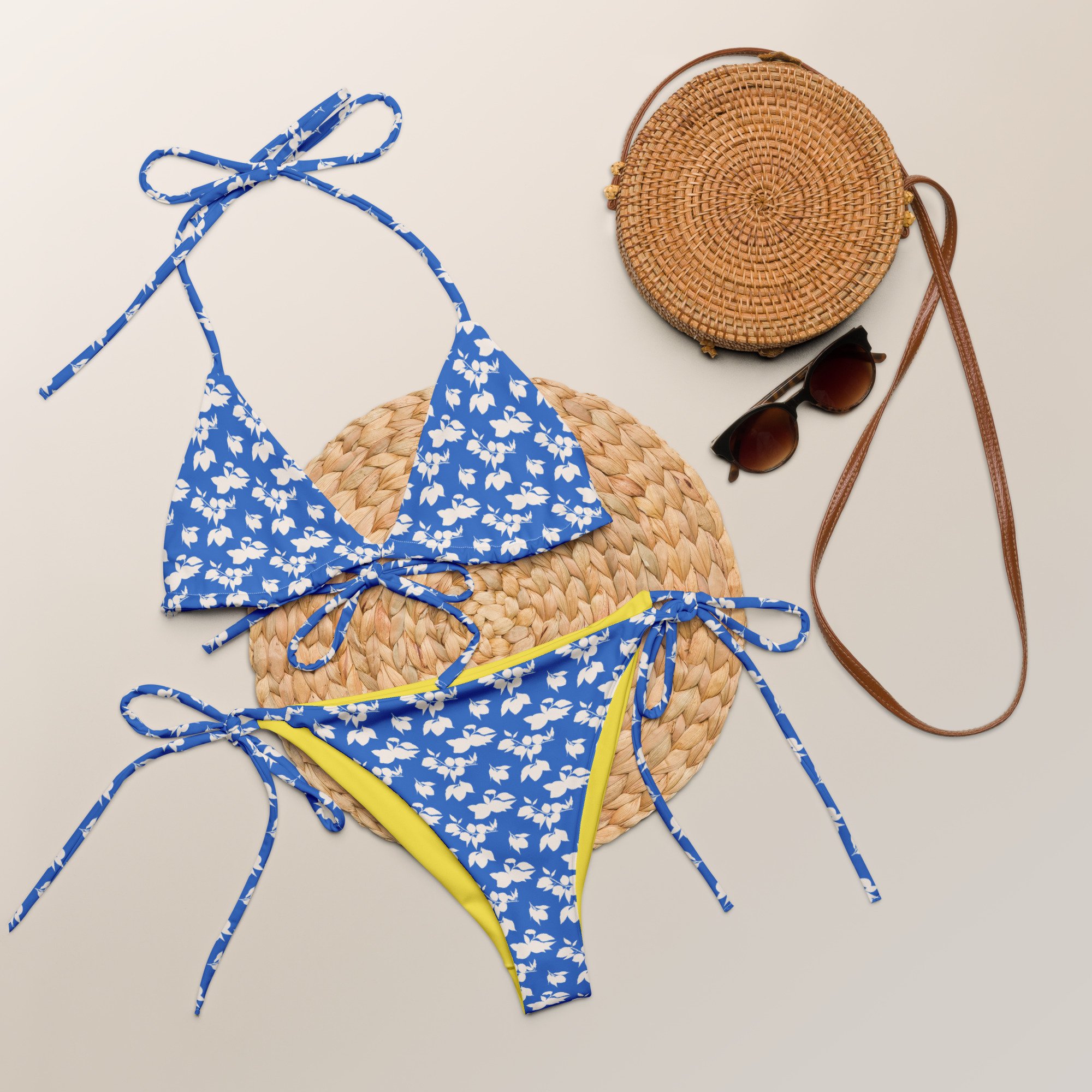 all-over-print-recycled-string-bikini-white-front-64a5933bdddd7.jpg