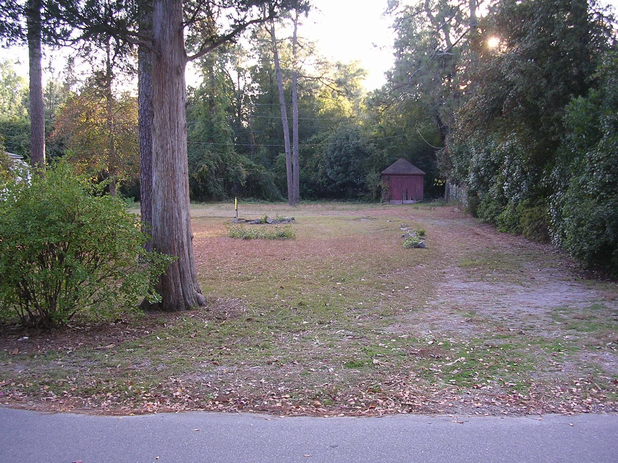 Driveway with Old Dirt Floor Red  Garage.JPG