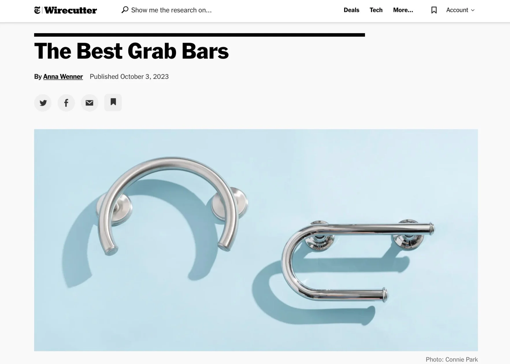Screenshot of the top of a Wirecutter article titled "Best Grab Bars" with the text below reading "Published October 3, 2023." The included image shows a light blue background with two silver grab bars over it.