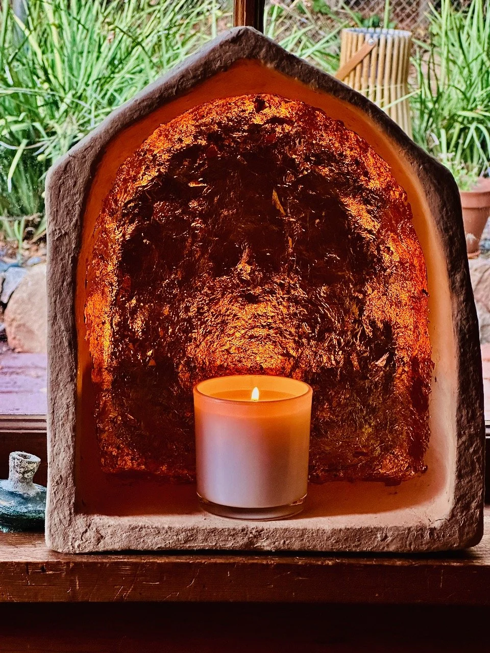 sbb candle in golden altar.jpeg