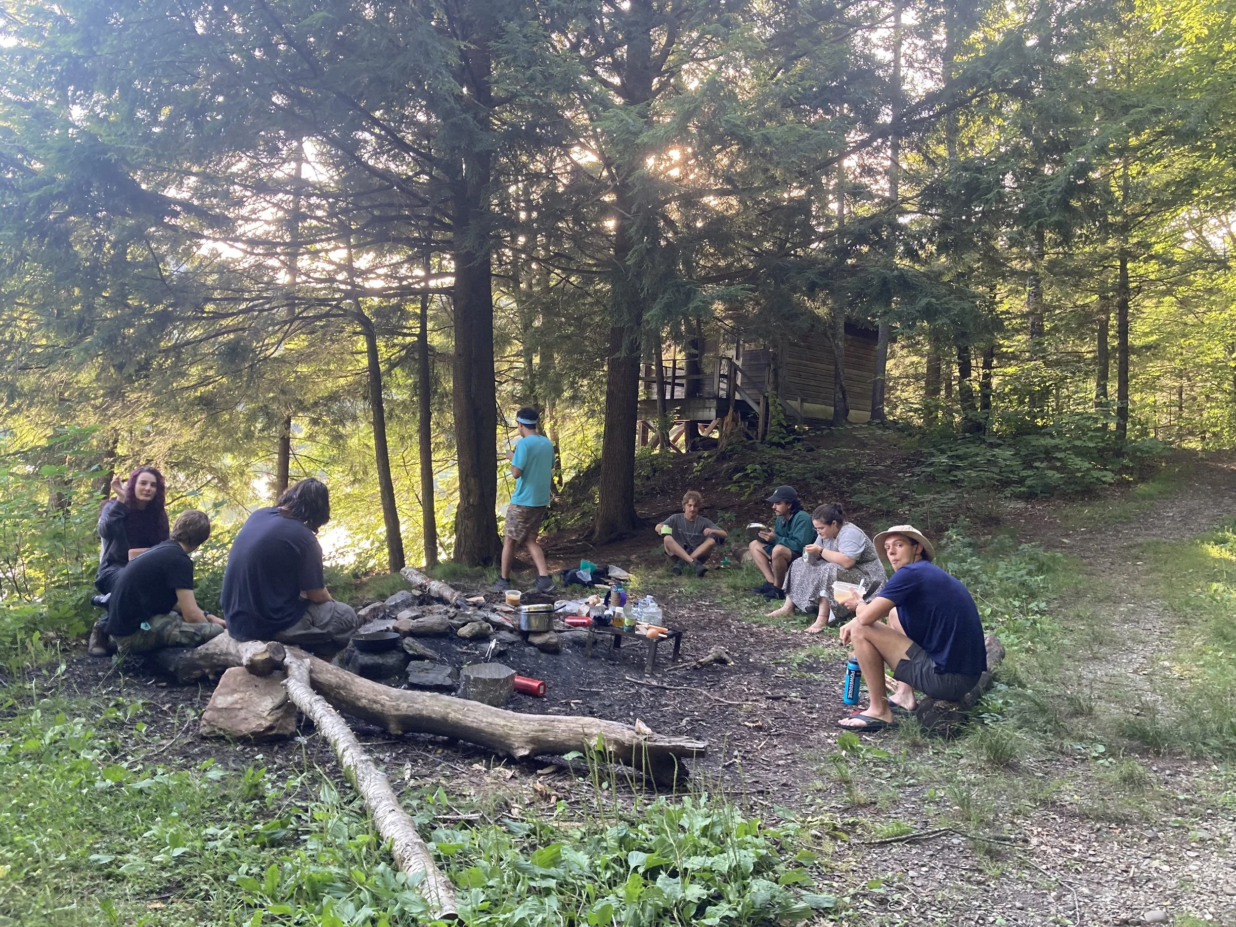�����ؿ� Pre-College students reflect around the fire.