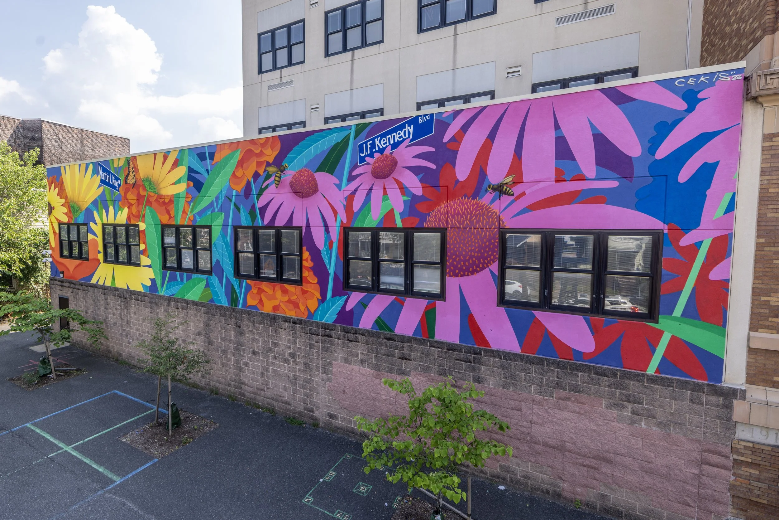 Final mural titled "The School is Like a Garden". Photo by Jennifer Brown. 
