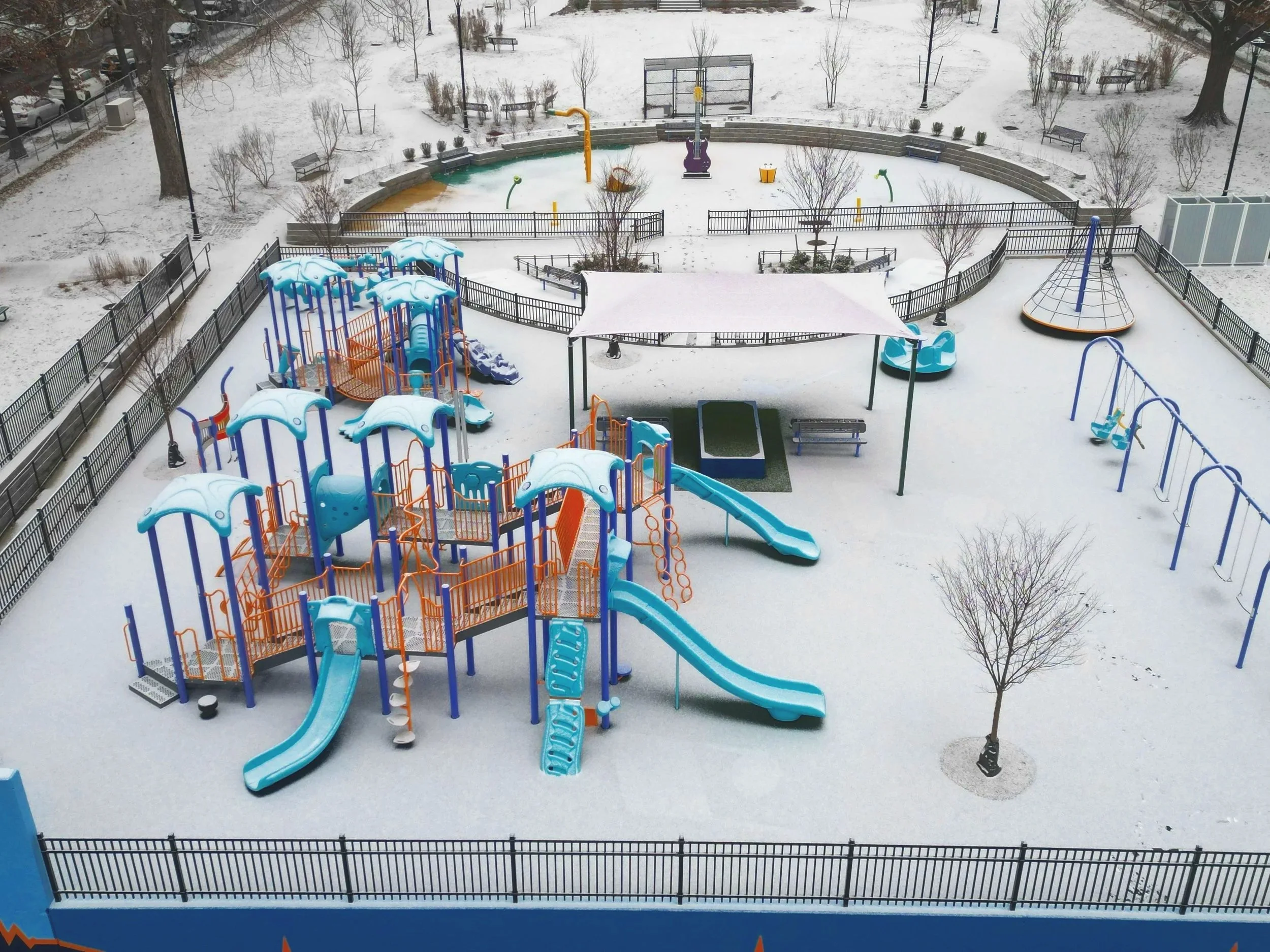 Aerial of new play equipment in snowy conditions.