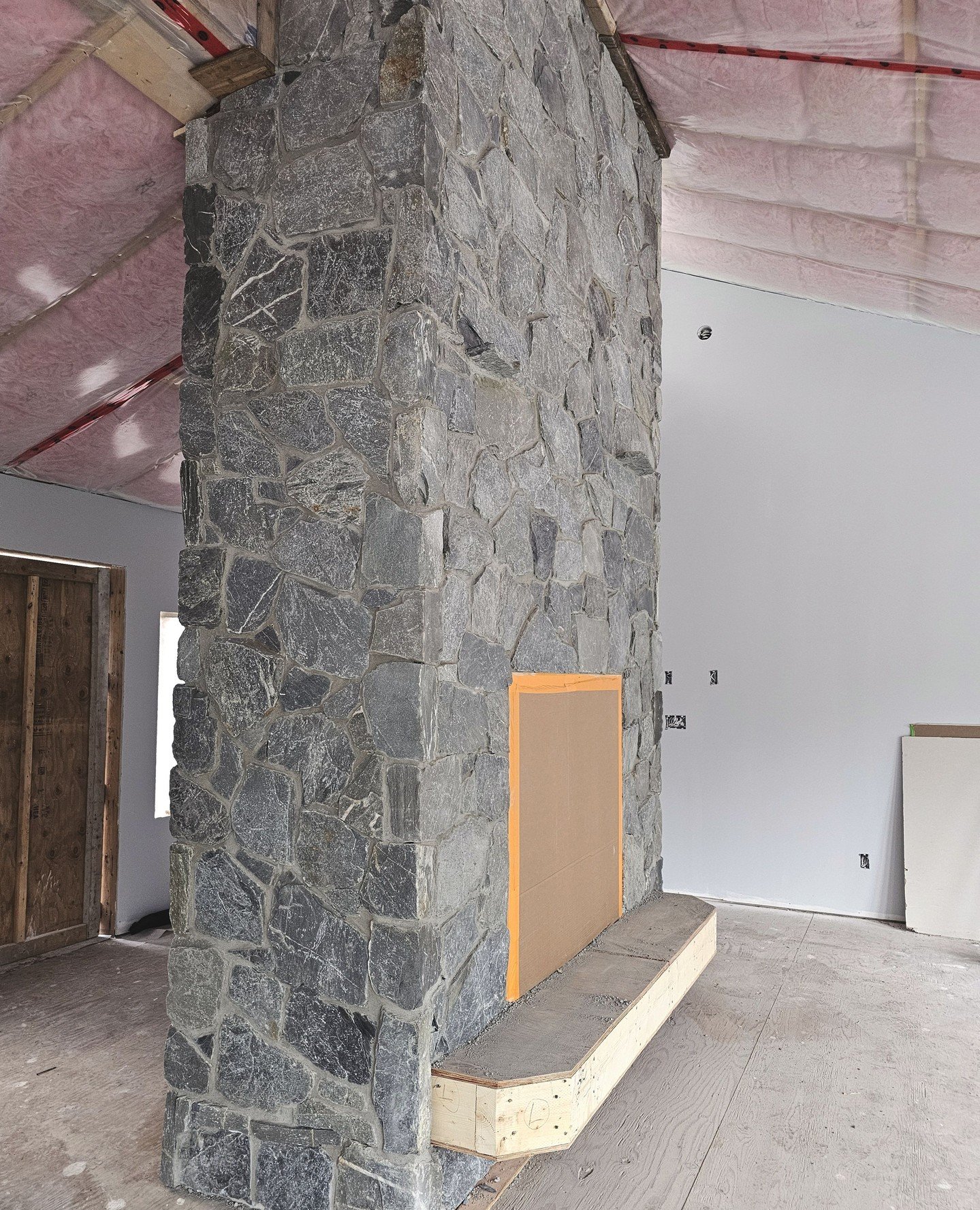 Not quite done but this fireplace is still impressive! Thanks @oldgrowthmasonry.  Can't wait to see how the lower floor family room turns out 👀🩶⁠
⁠
@k2stonematt⁠