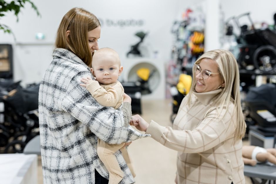 Theresa connecting with a parent and baby after an infant CPR class.